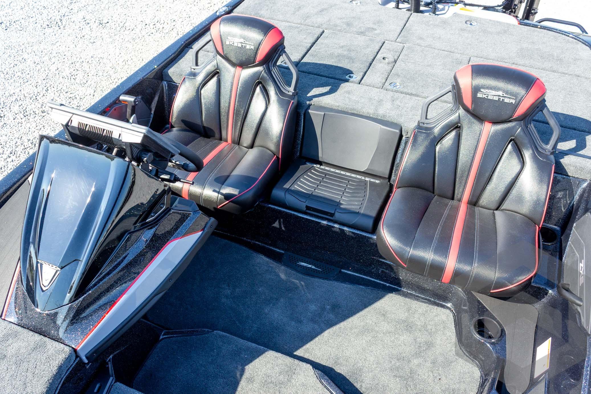 2026 Skeeter ZXE20 boat interior with black and red seats, modern dashboard.