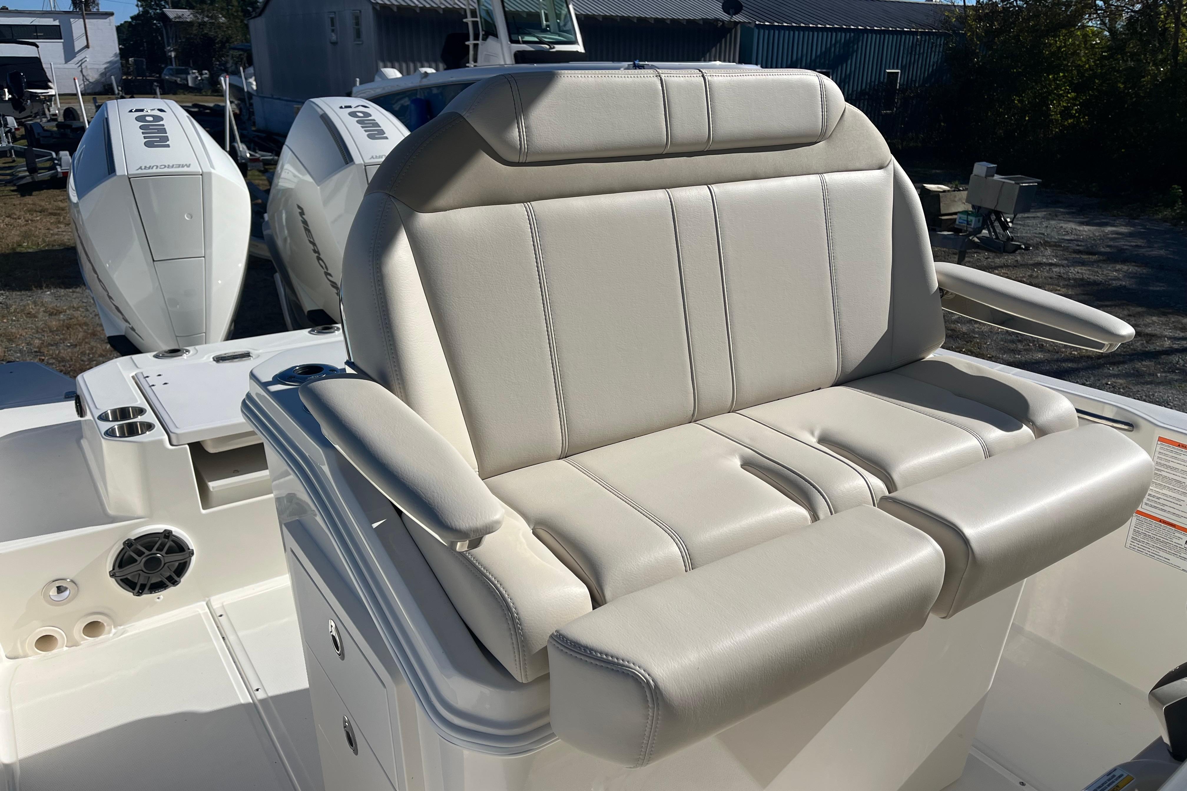2026 Boston Whaler 280 Dauntless boat with comfortable seating and dual Mercury engines.