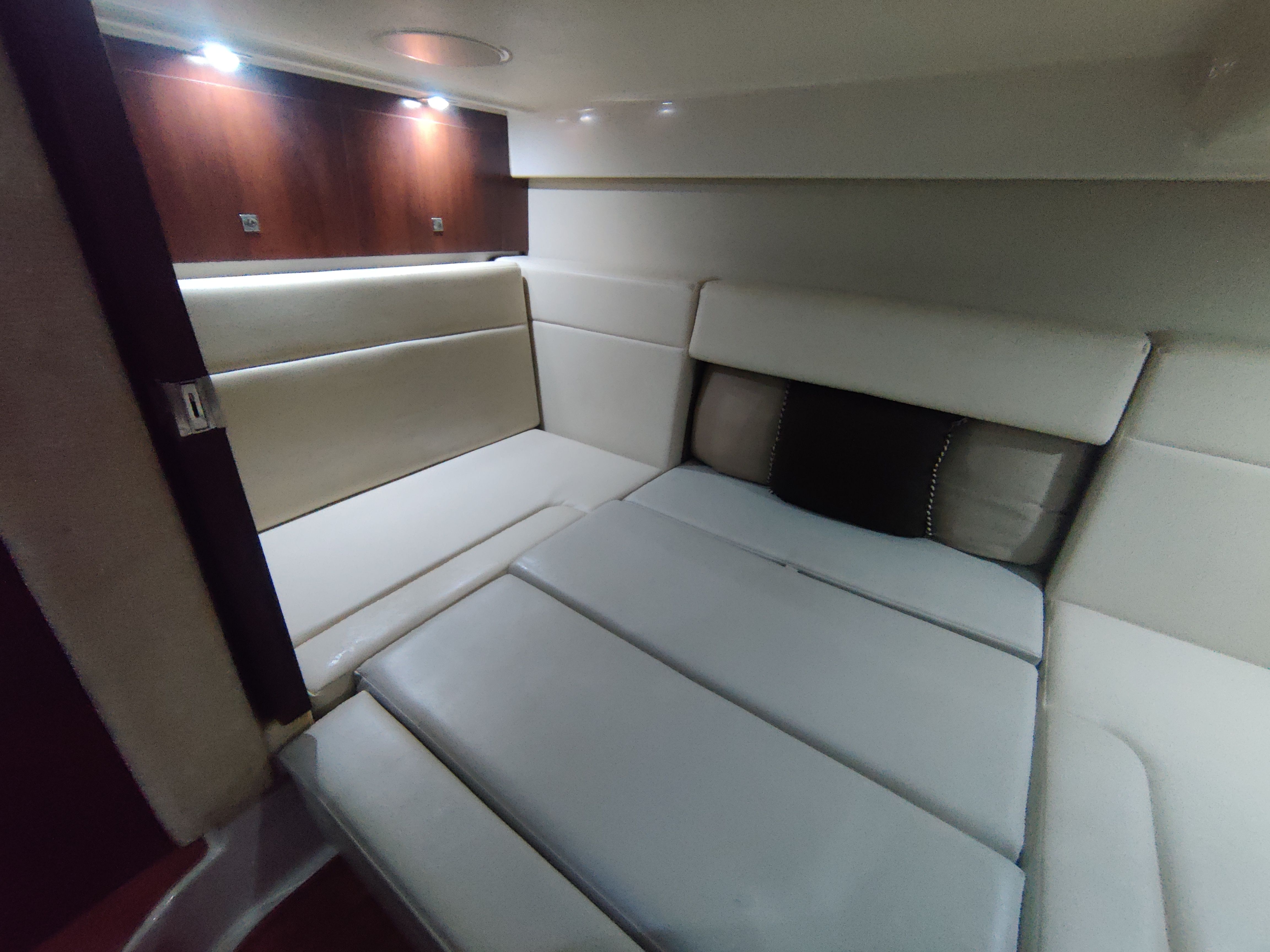 Interior of 2014 Chaparral 330 Signature with comfortable seating.