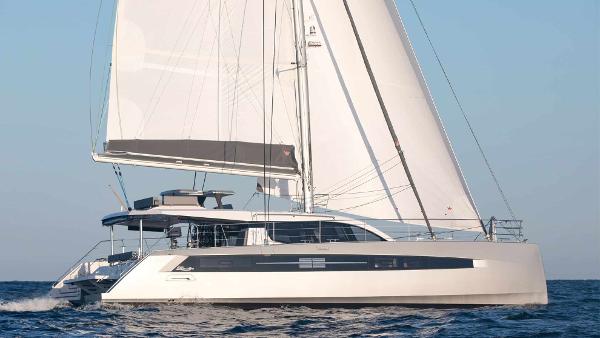2025 Privilege Signature 580 yacht sailing on open sea under clear skies.