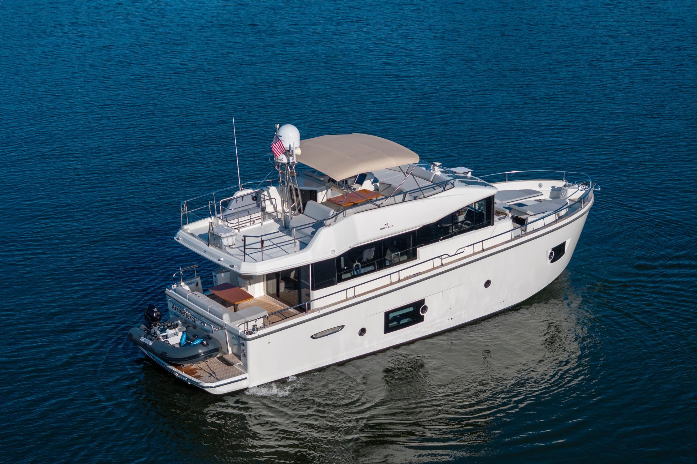 2018 Cranchi Eco Trawler 53 Long Distance yacht cruising on calm blue waters.