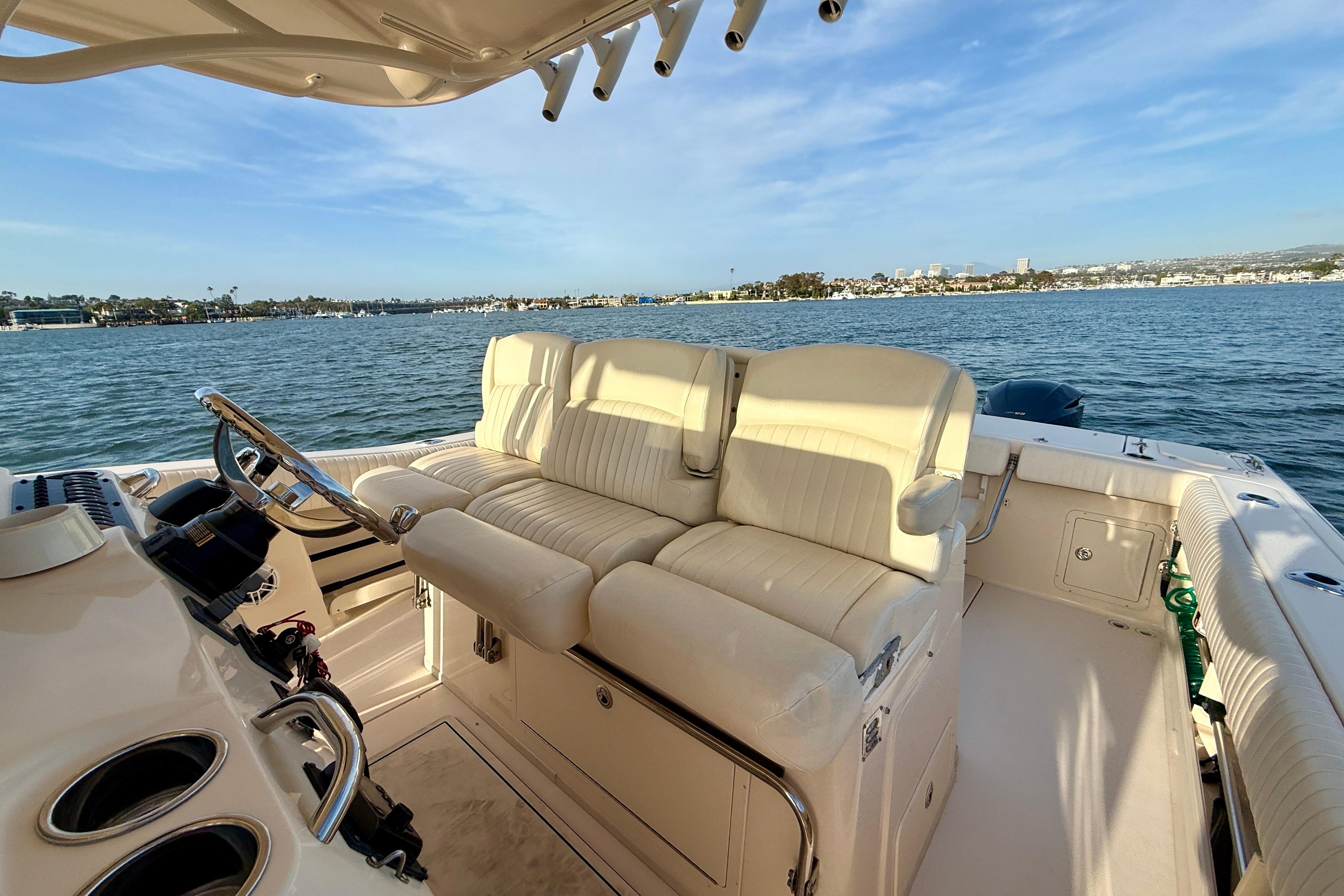2012 Grady-White Canyon 336 boat interior with plush seating, overlooking serene waters.