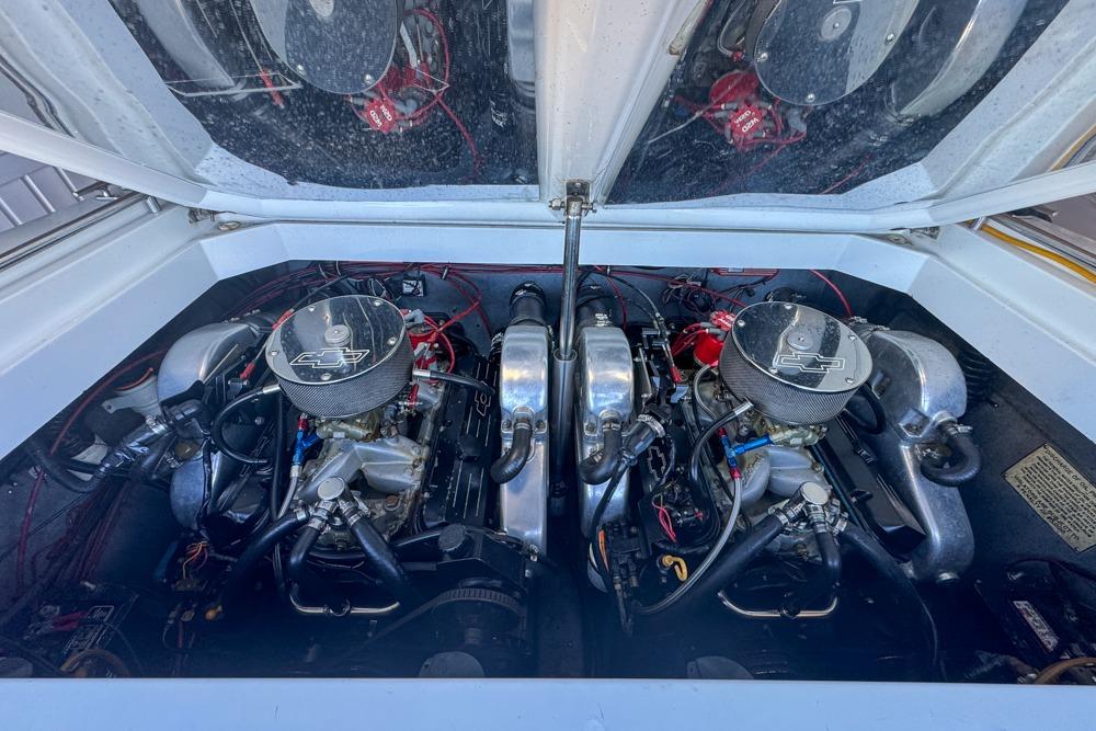 Twin engines in a 1989 Formula 292 SR-1 boat, showcasing detailed mechanical components.