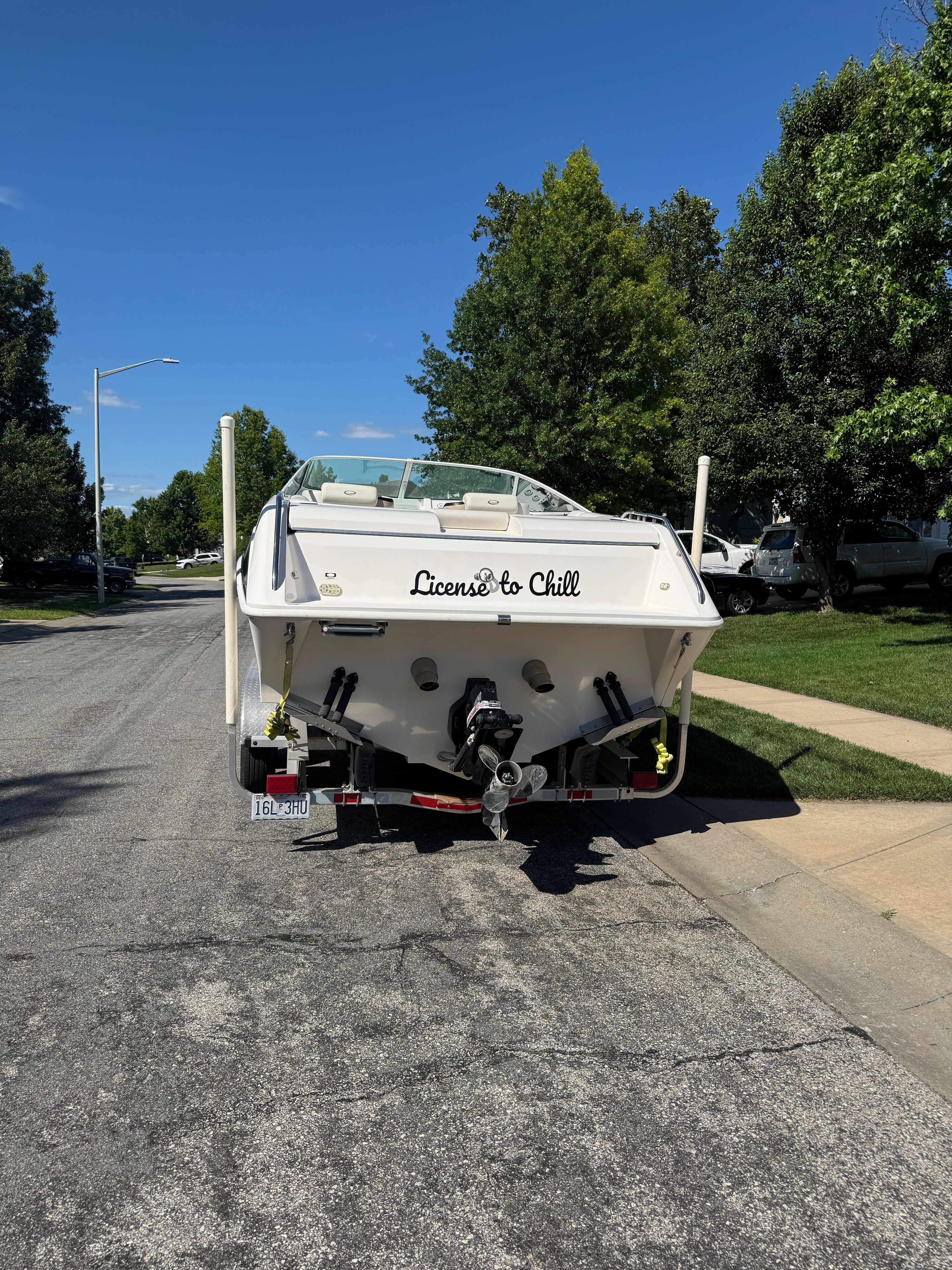 2003 Envision 2900 DLX on a trailer in a residential street.