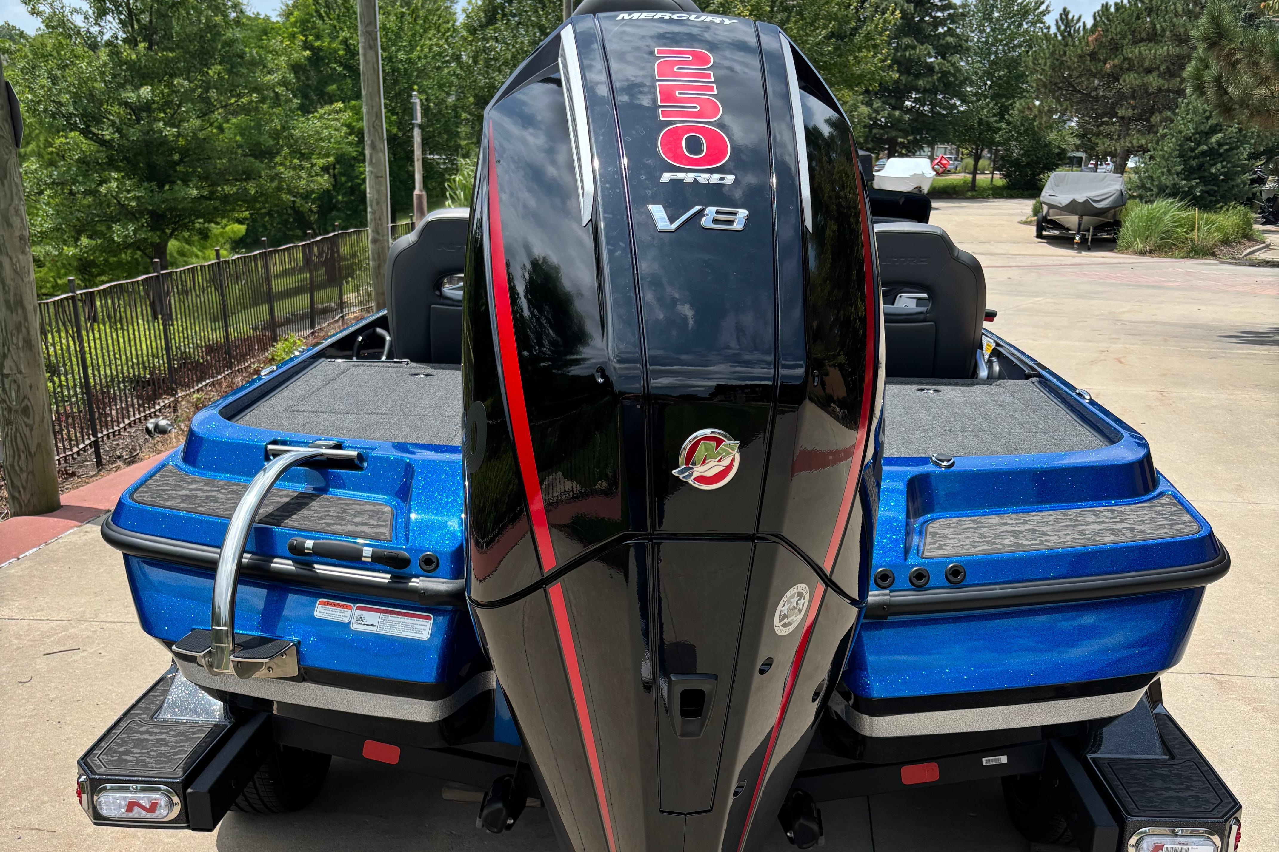 2026 Nitro Z20 XL Pro boat with powerful V8 engine, parked outdoors.