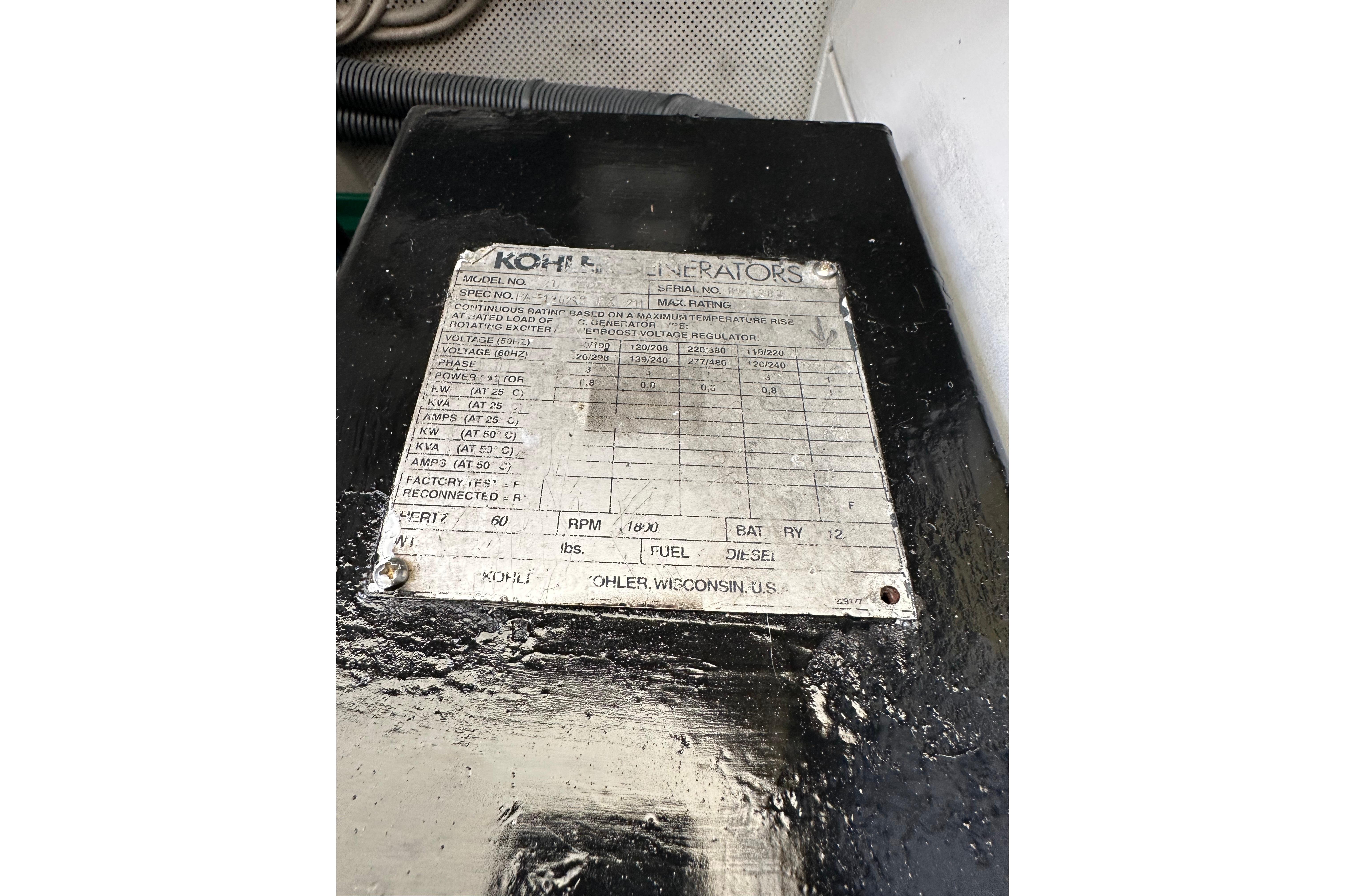 Kohler generator label on a 2004 Azimut 55E yacht, detailing specifications and ratings.