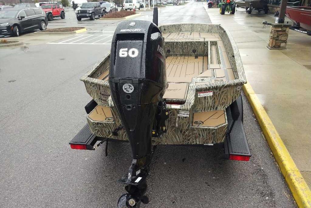 2026 Tracker Grizzly 1756 T Marsh boat with Mercury 60 outboard motor.