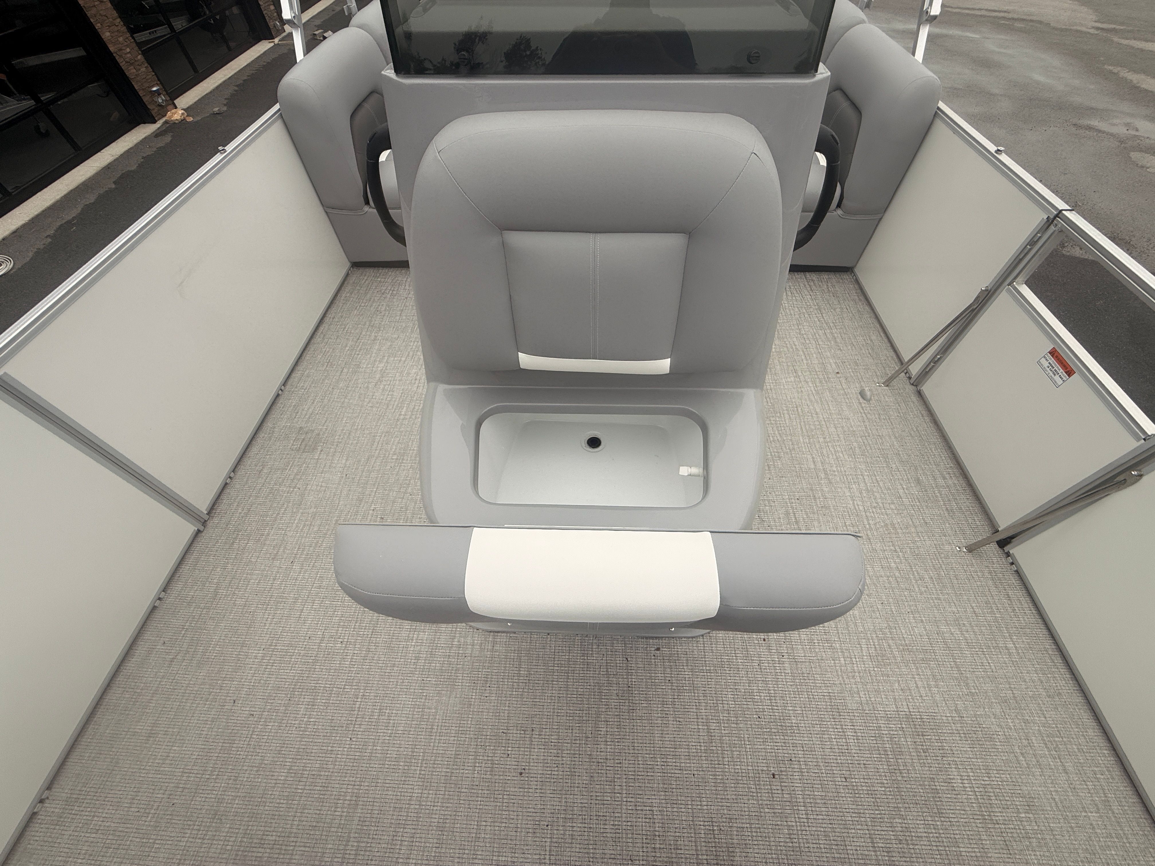 Interior of 2026 Landau Alure 23CC Fish with gray seating.