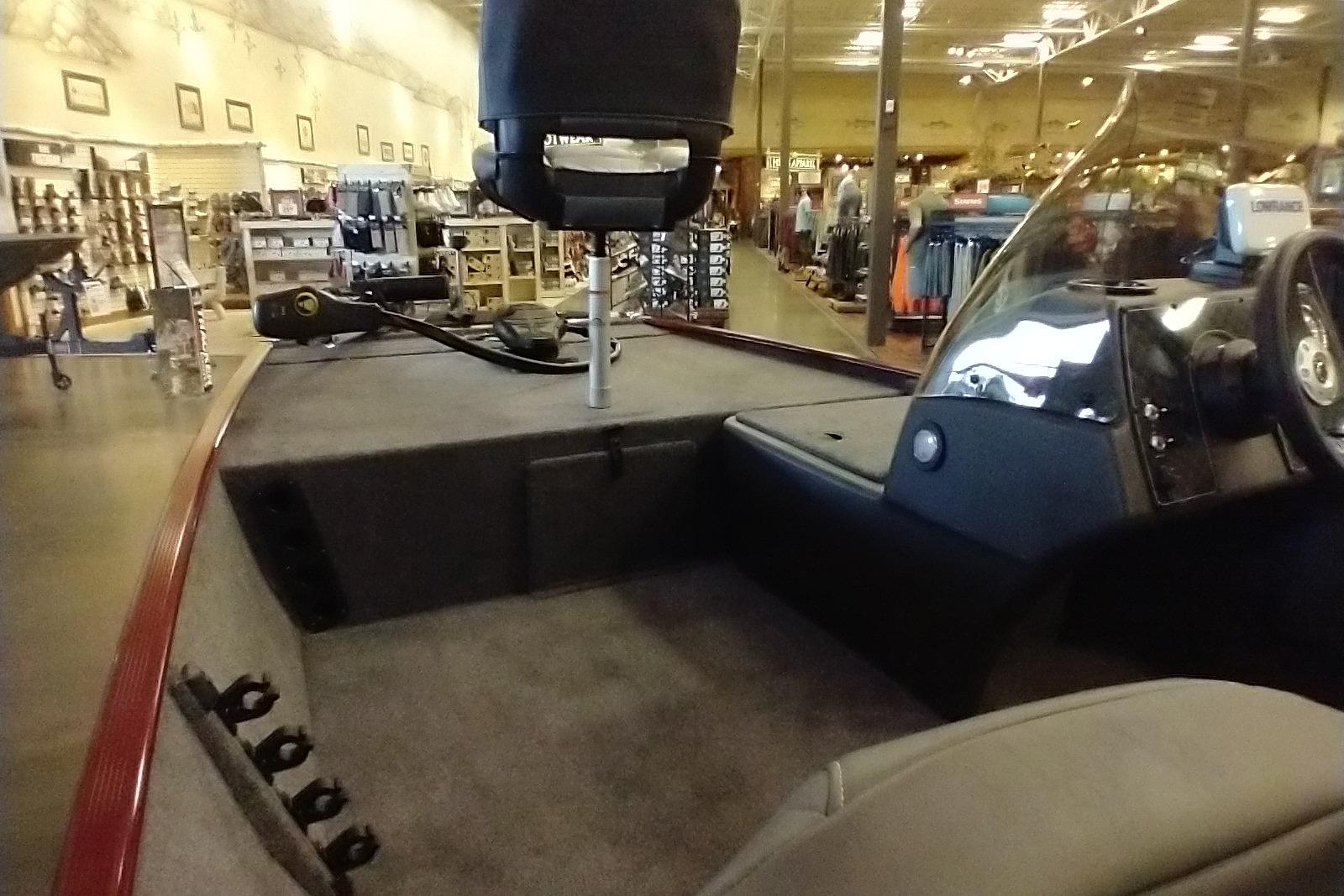 2026 Tracker Bass Tracker Classic XL boat interior in showroom setting.