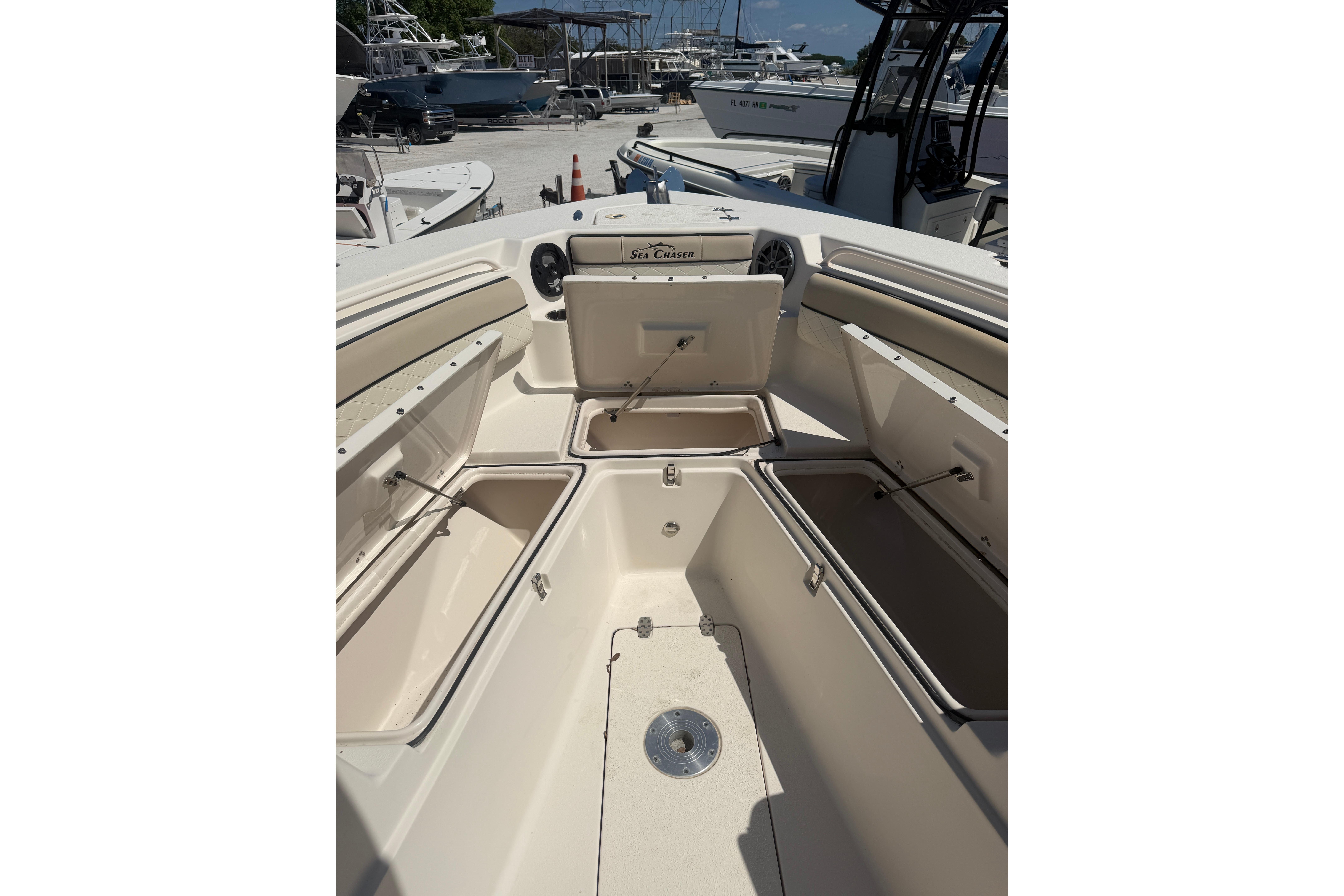 2021 Sea Chaser 30 HFC CC boat interior with open storage compartments.