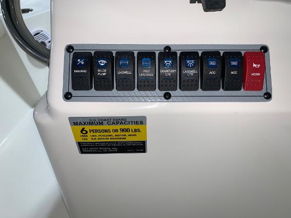 Control panel of 2026 Key West 188 Bay Reef boat with capacity label.