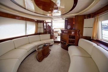 Luxurious interior of 2003 Azimut 74 Solar yacht with elegant seating and modern design.
