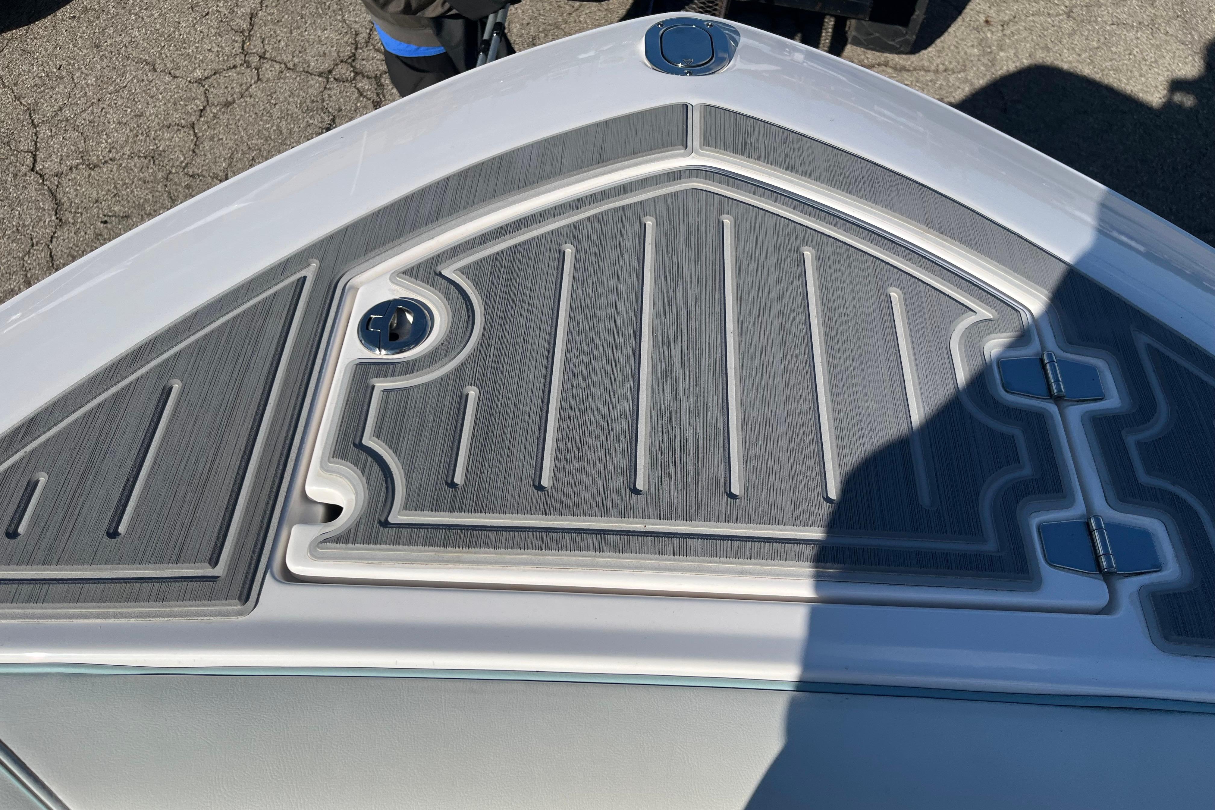 2024 Regal LS9 Surf boat deck with textured gray surface and sleek design.