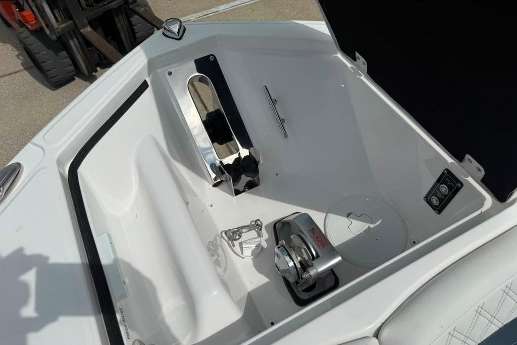 2026 Sea Fox 288 Traveler boat anchor compartment with winch and storage features.