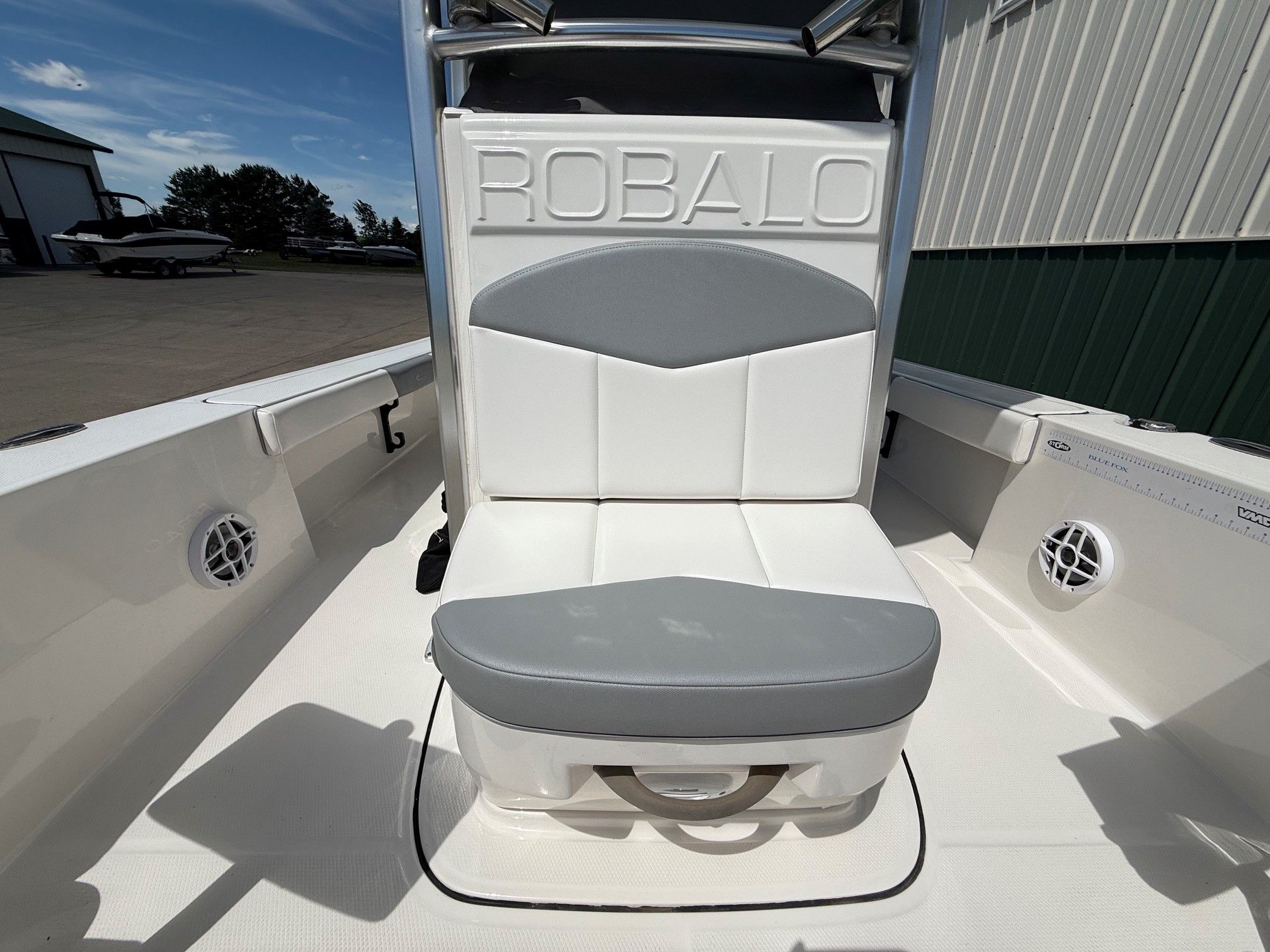Robalo 226 Cayman 2021 boat seat with gray and white upholstery.