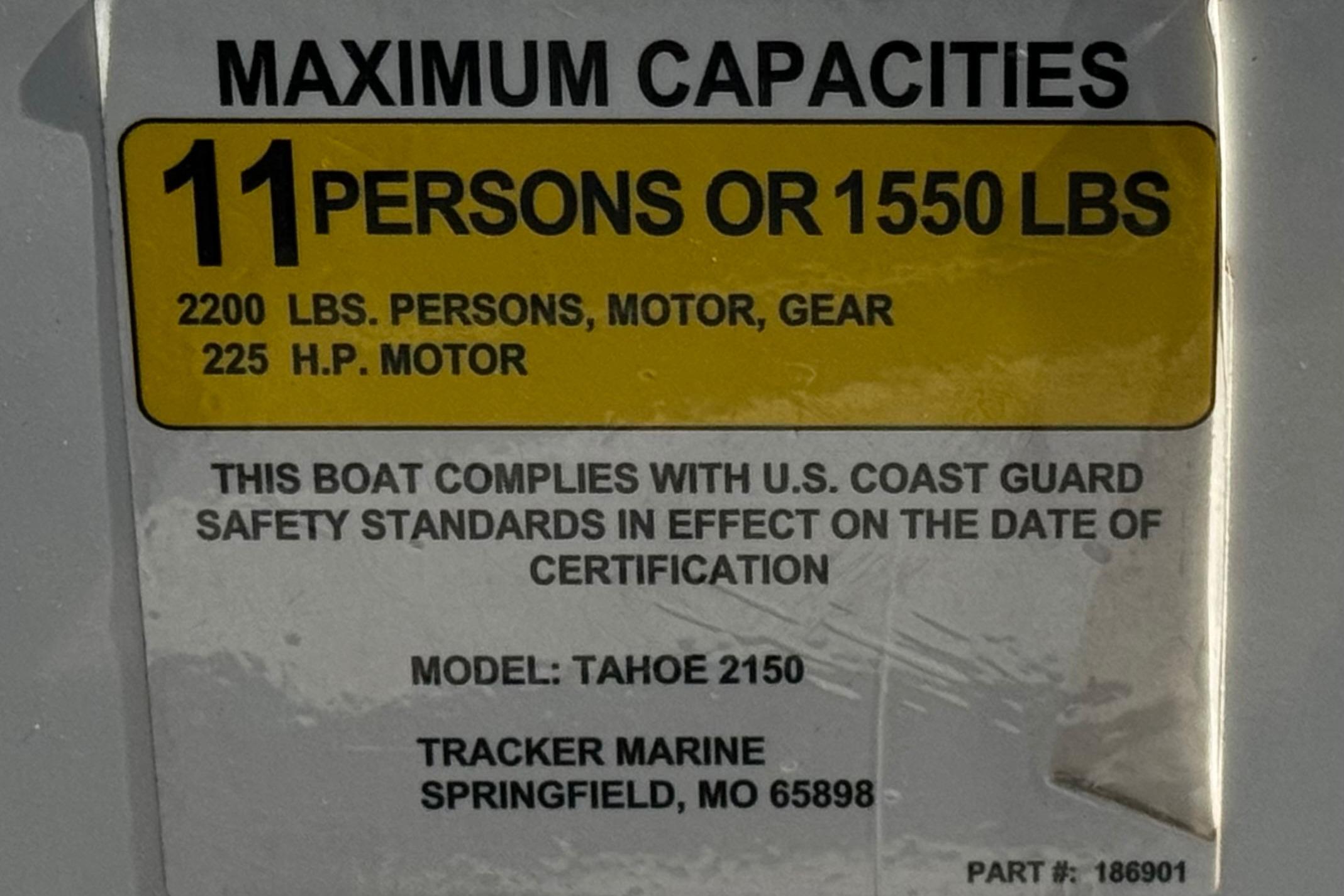 2019 Tahoe 2150 boat capacity label: 11 persons or 1550 lbs, 225 HP motor.