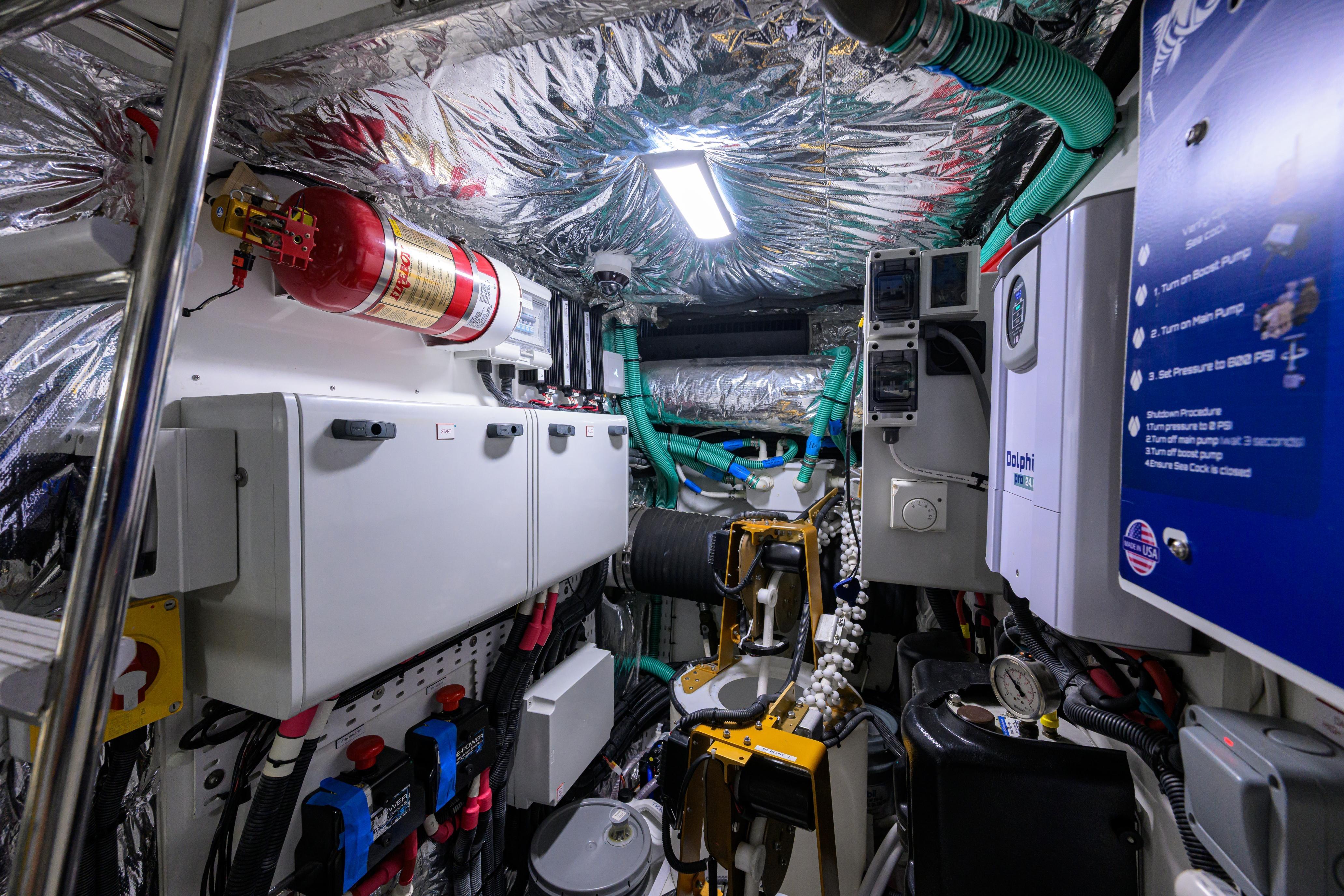 Engine room of a 2020 Princess F70 yacht with advanced equipment and fire safety system.