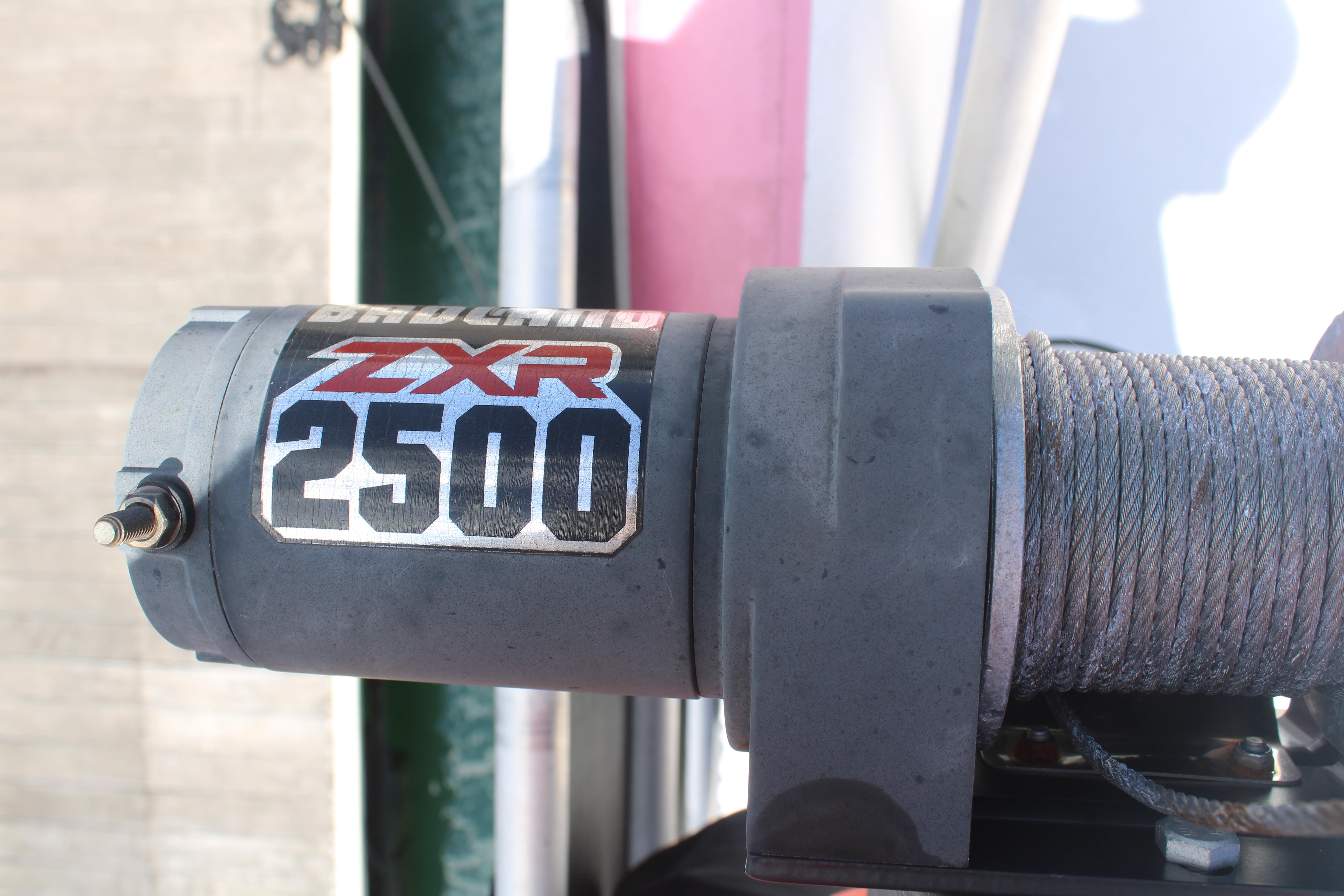 Close-up of a Superwinch ZXR 2500 winch on a 1992 Sumerset 66.