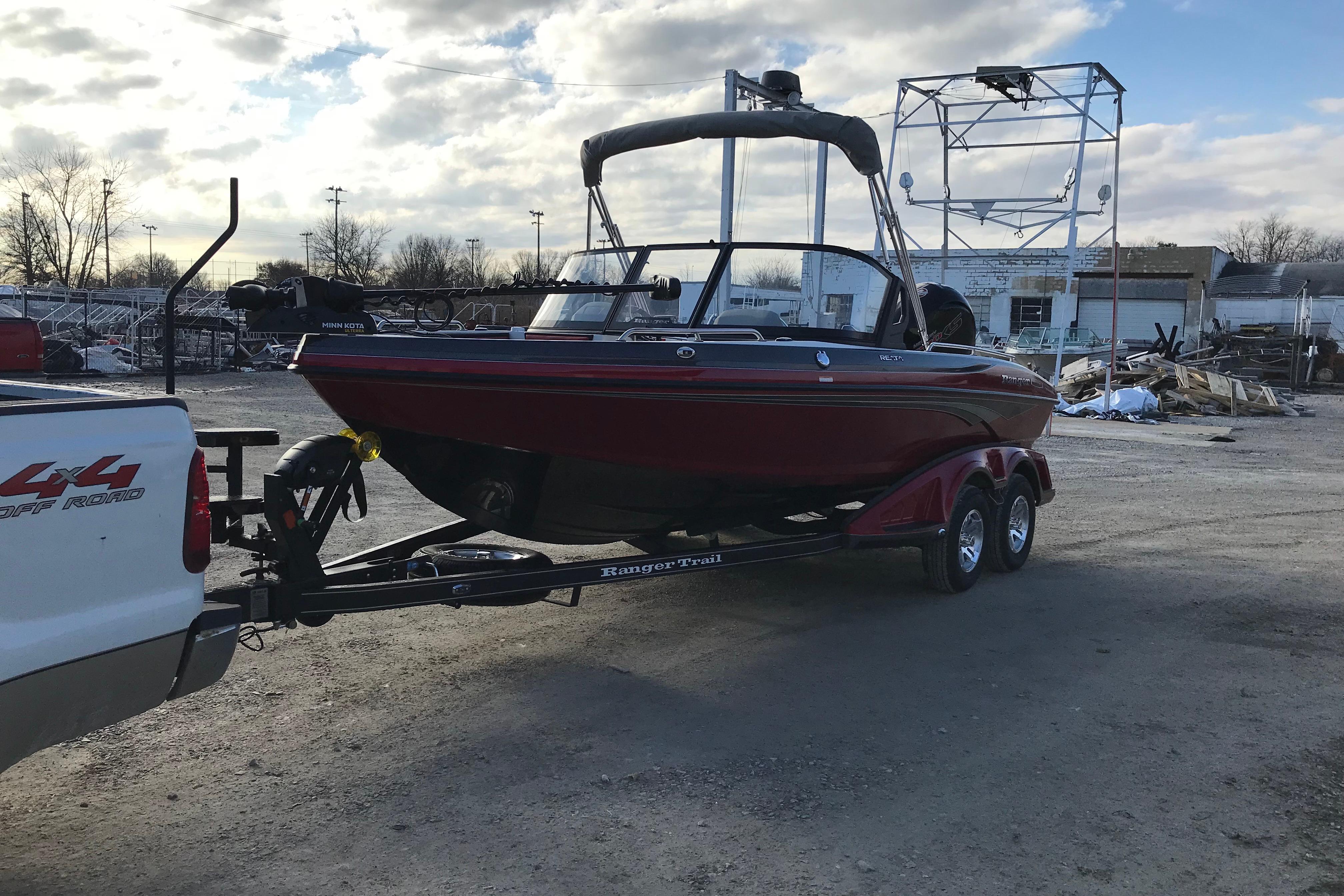 2026 Ranger 1850MS boat on trailer, parked outdoors, attached to a 4x4 truck.
