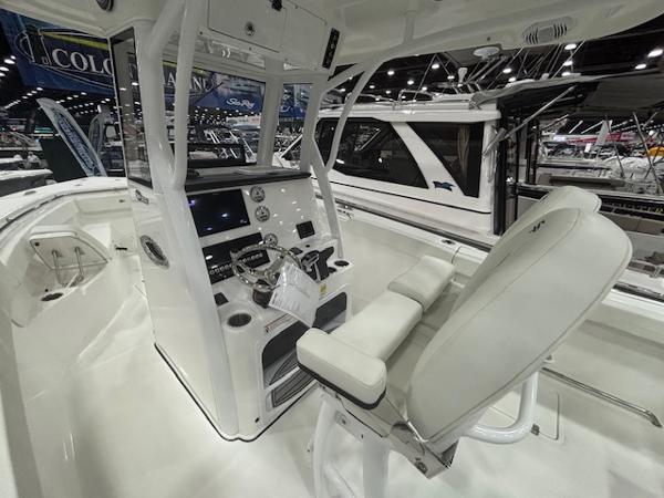2025 Sea Pro 262 Offshore boat interior with modern helm and seating.
