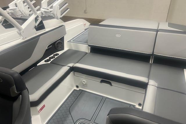 2025 Cobalt CS23 Surf boat interior with sleek gray seating and modern design.
