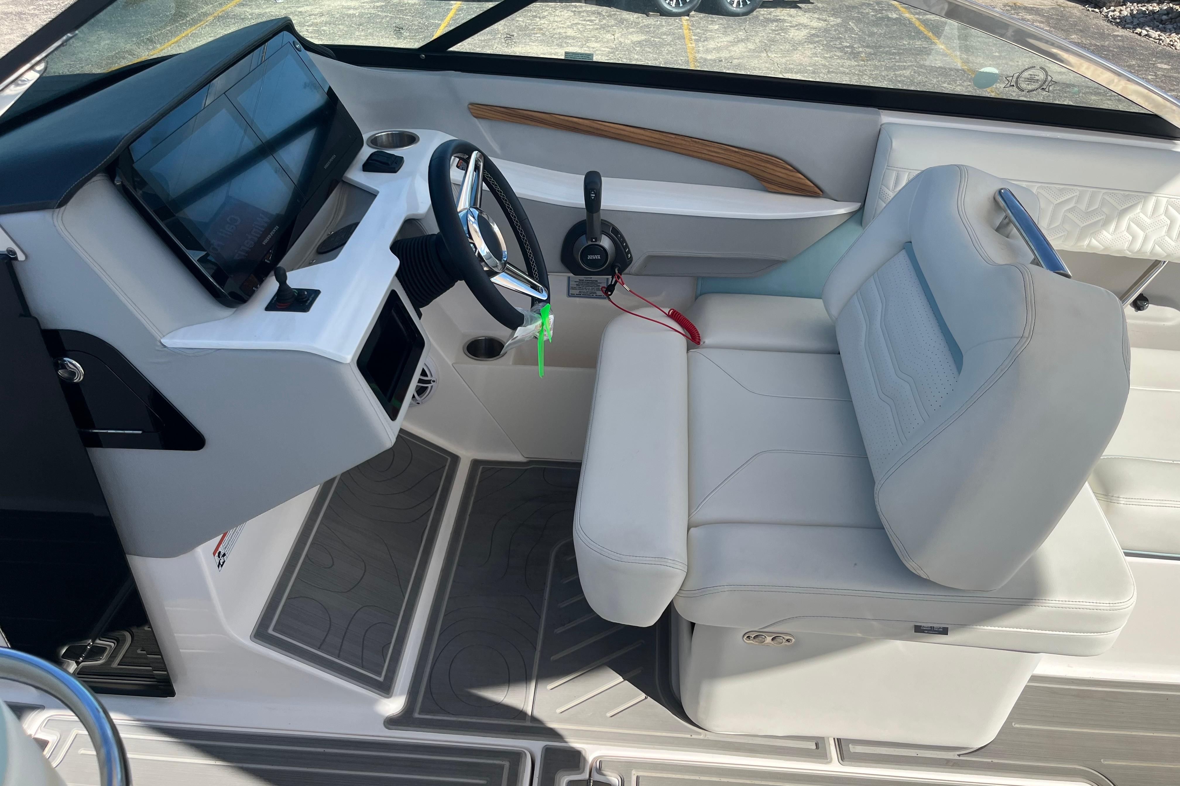 2024 Regal LS9 Surf boat interior with modern dashboard and comfortable seating.