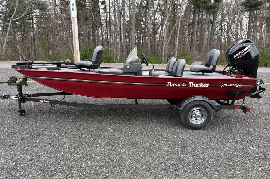 2026 Tracker Bass Tracker Classic XL boat on trailer, parked outdoors.