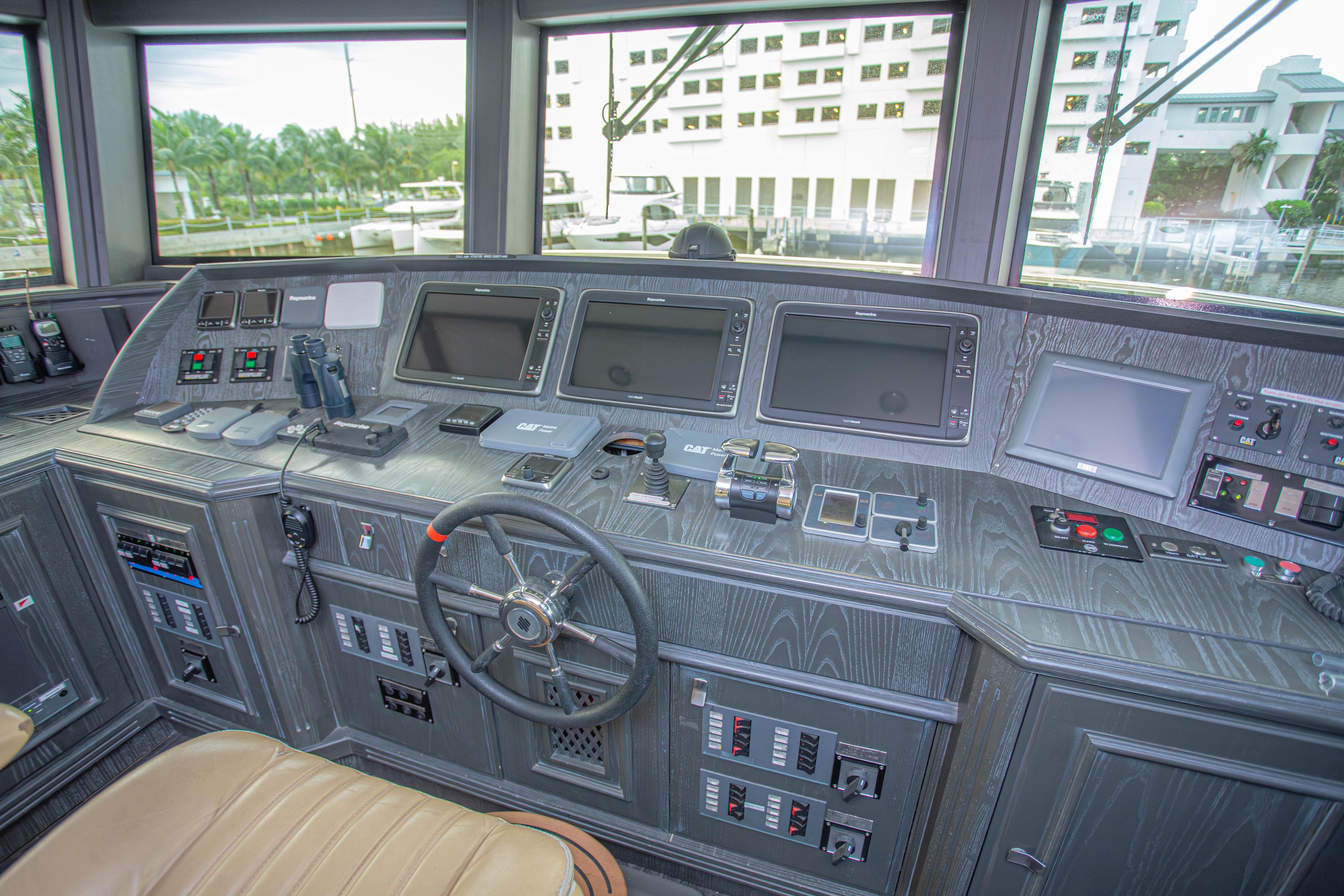 Control room of 2014 Fifth Ocean Yachts 24m Displacement Explorer Yacht, featuring advanced navigation equipment.