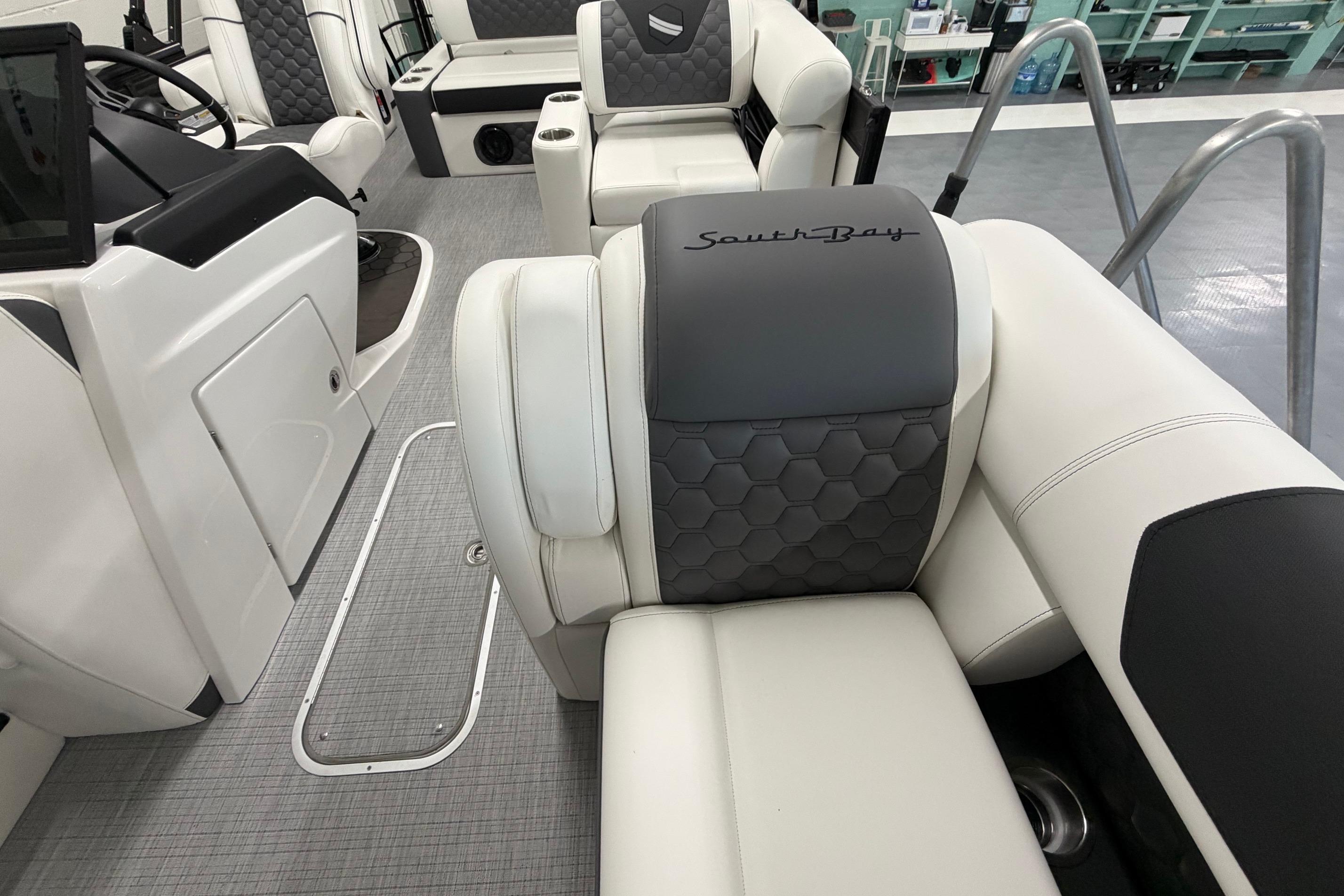 Luxurious interior of 2026 South Bay 525SB2 pontoon boat with elegant seating design.