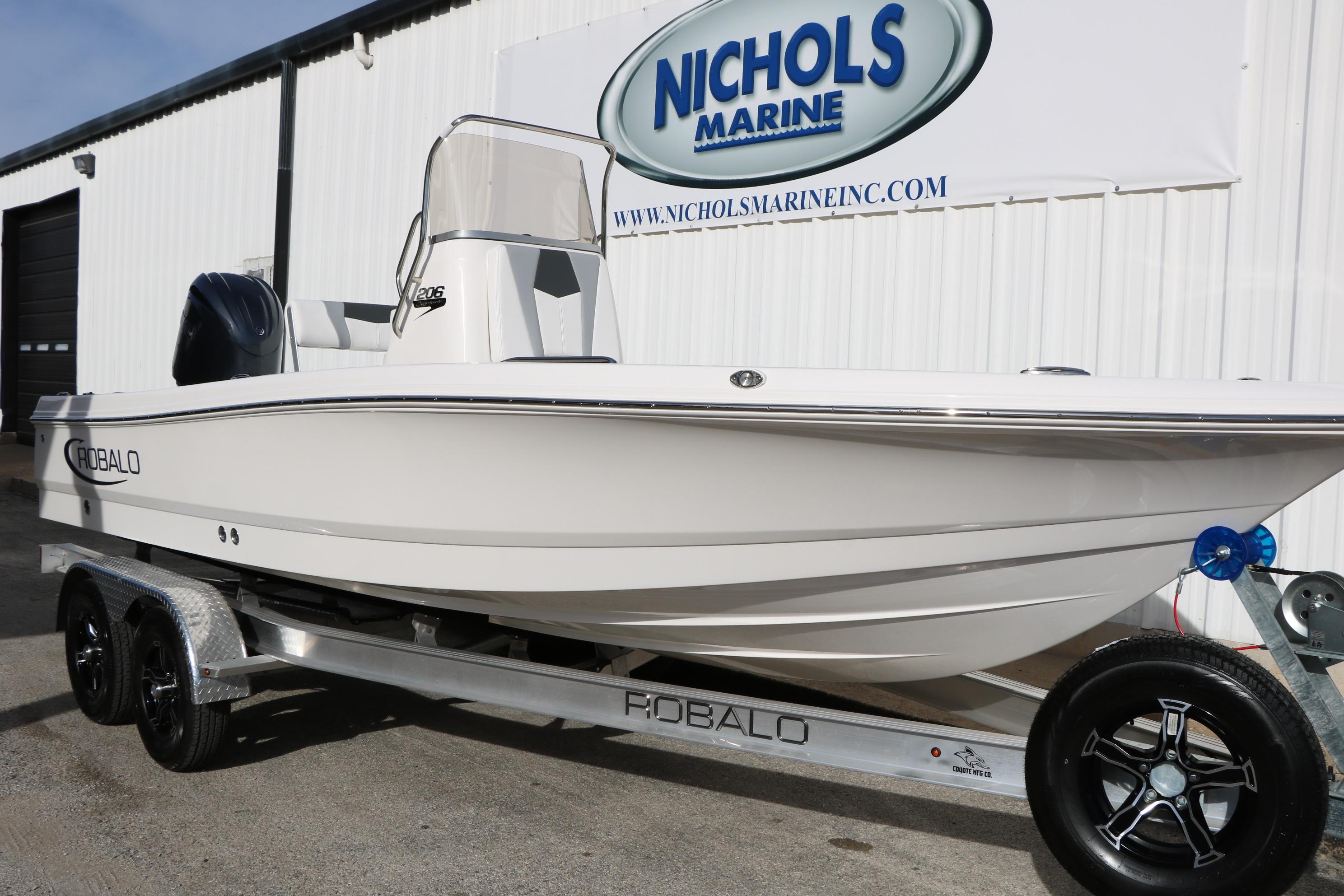 2026 Robalo 206 Cayman boat on trailer at Nichols Marine dealership.