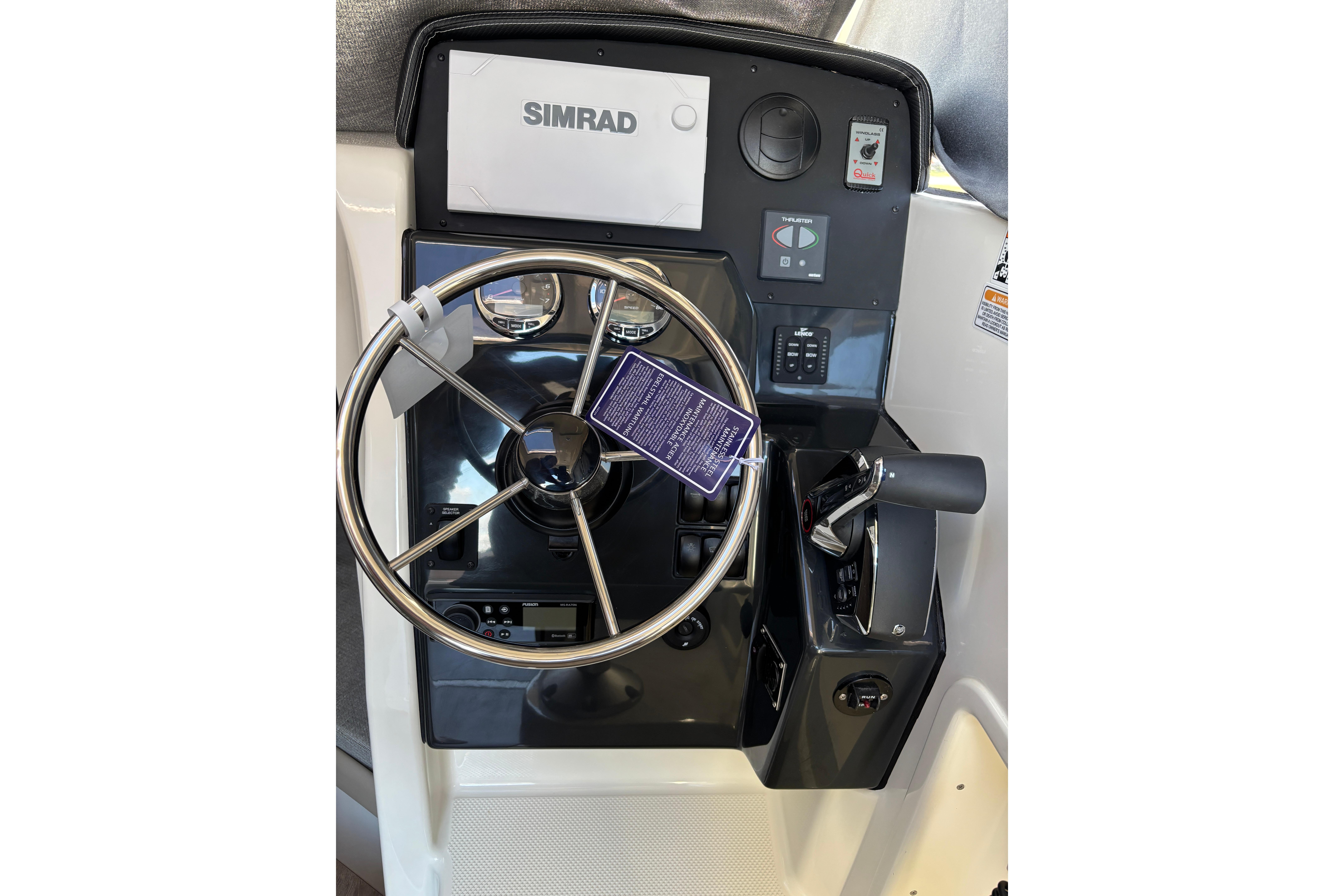 Steering console of 2026 Trophy T 25 Explorer boat with Simrad display.