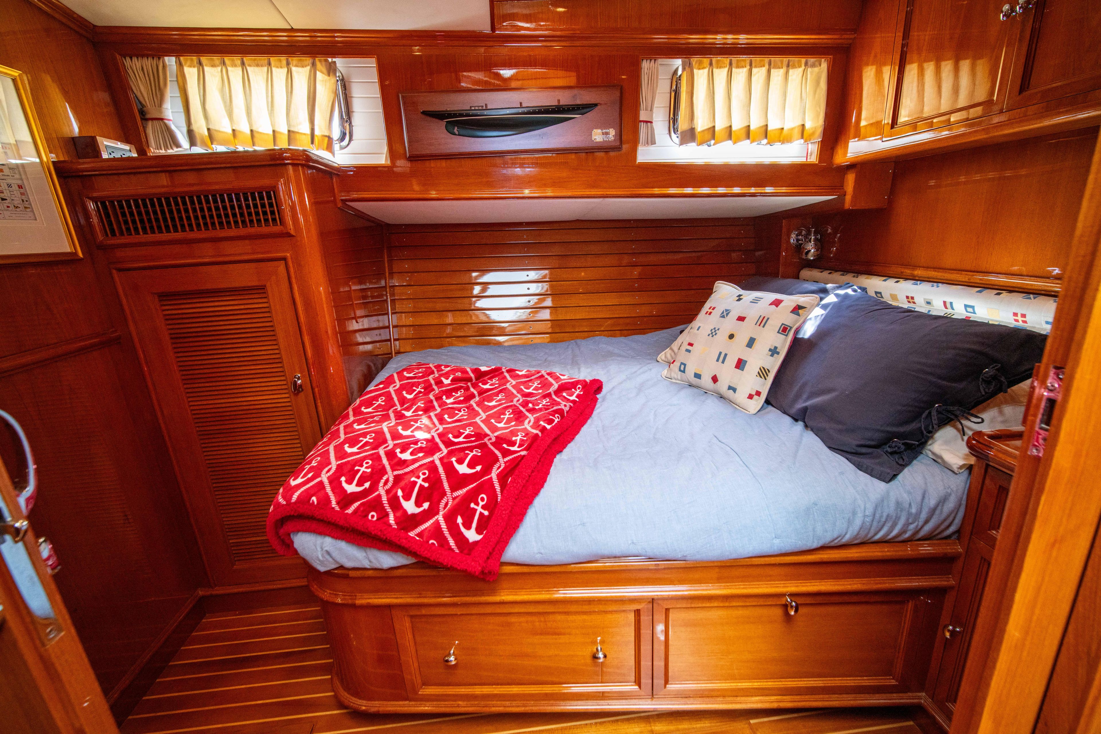 Luxurious wooden cabin interior of 2004 Grand Banks 58 Eastbay FB yacht.
