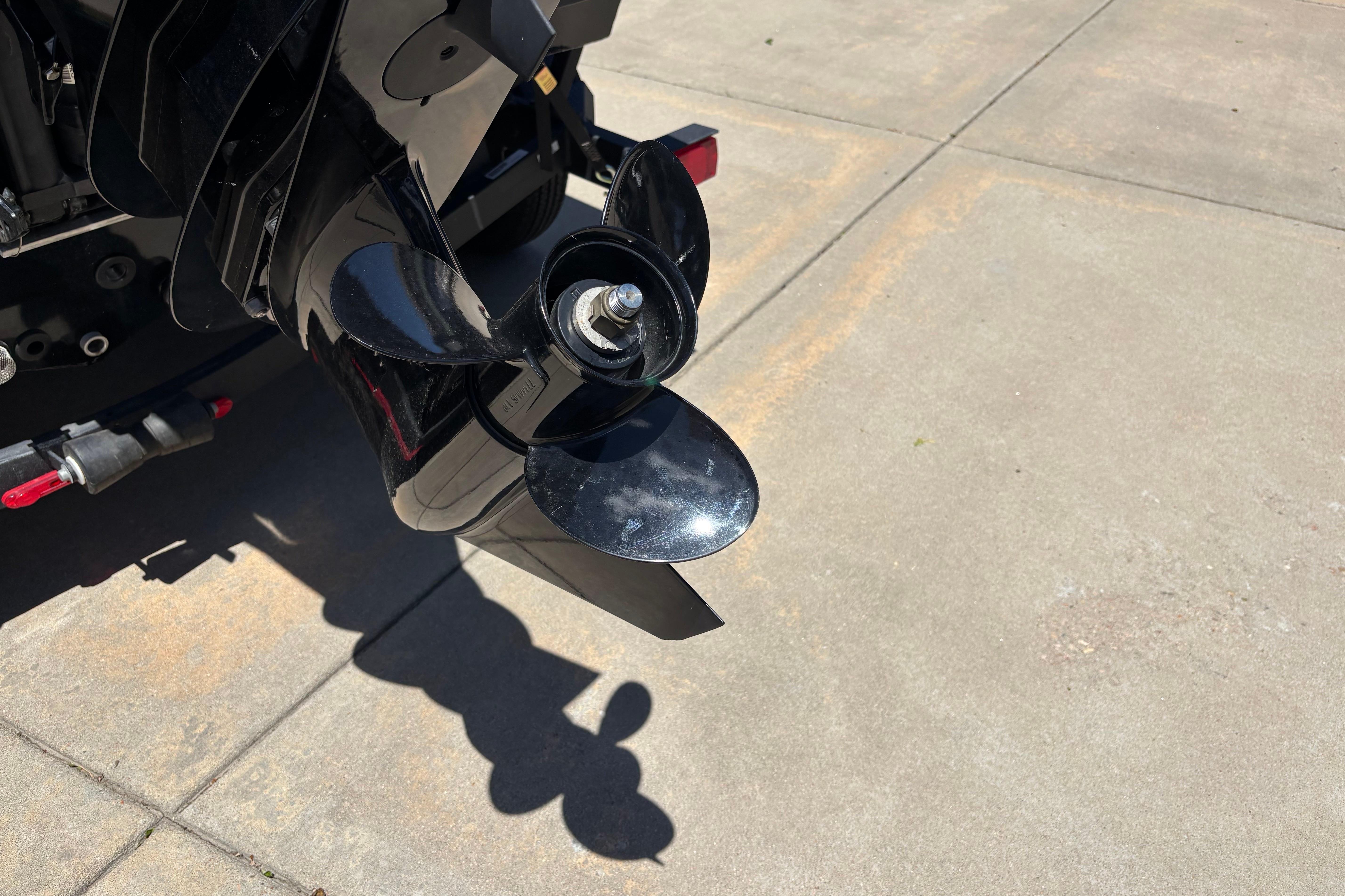 Propeller of 2025 Tracker Pro Guide V-175 Combo boat on concrete surface.