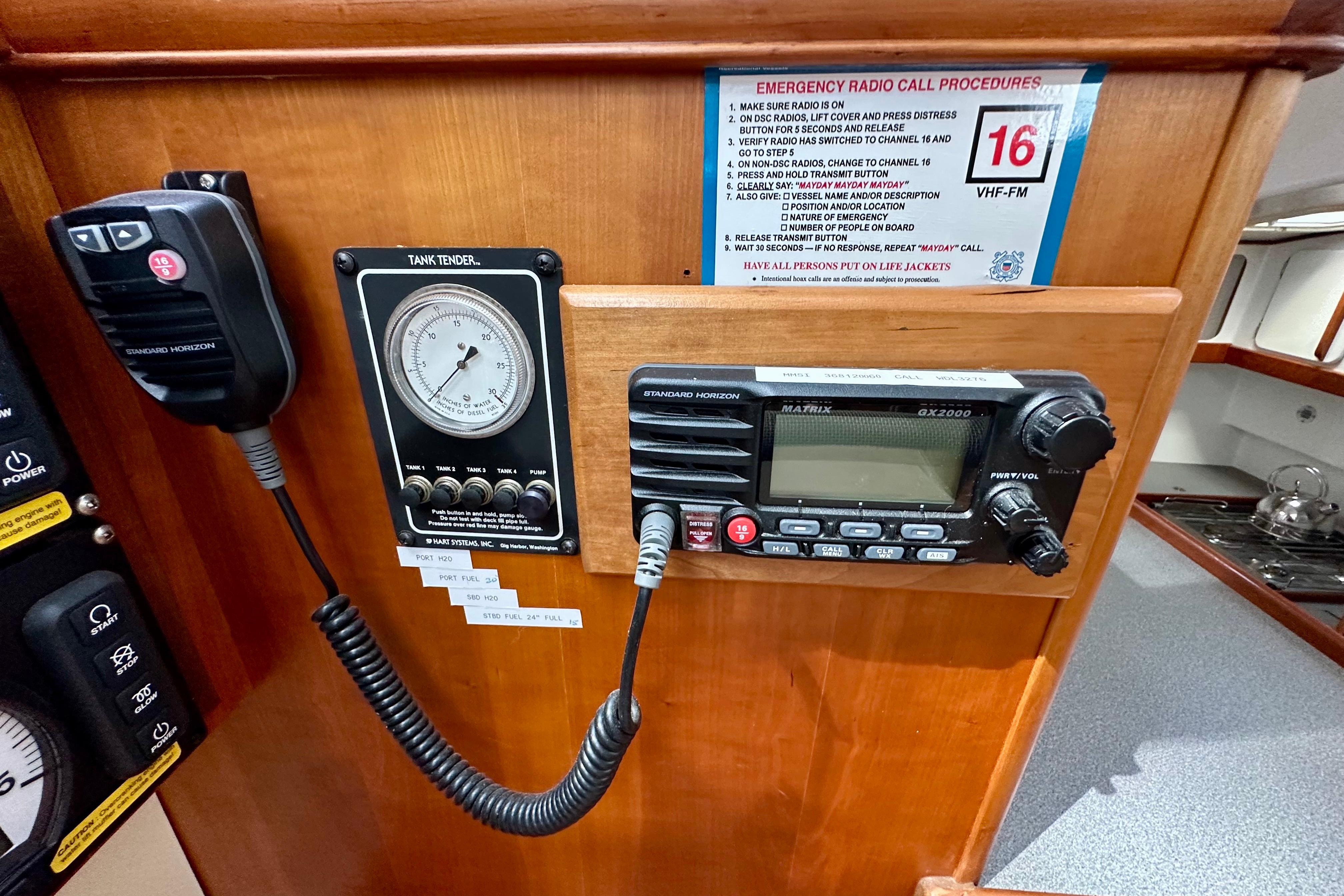 VHF radio and tank tender on 2003 Chris White Atlantic 42 yacht control panel.