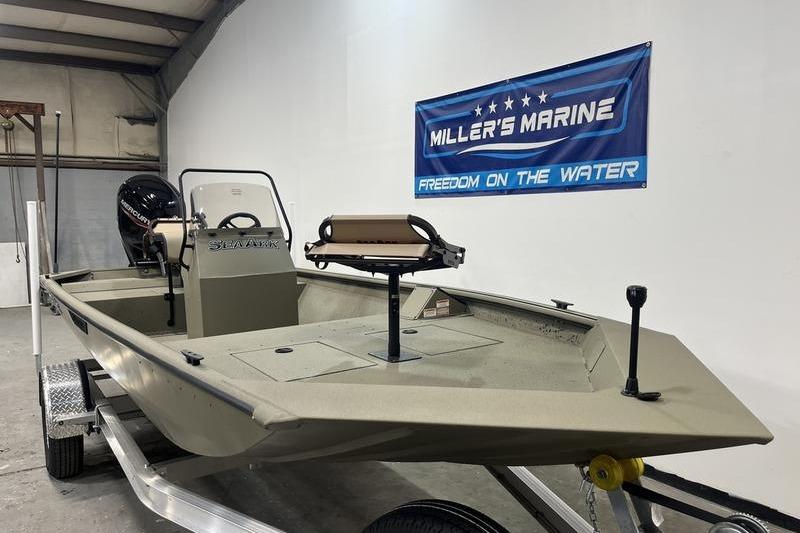 2025 SeaArk Shadow 18T boat in showroom, displayed by Miller's Marine.