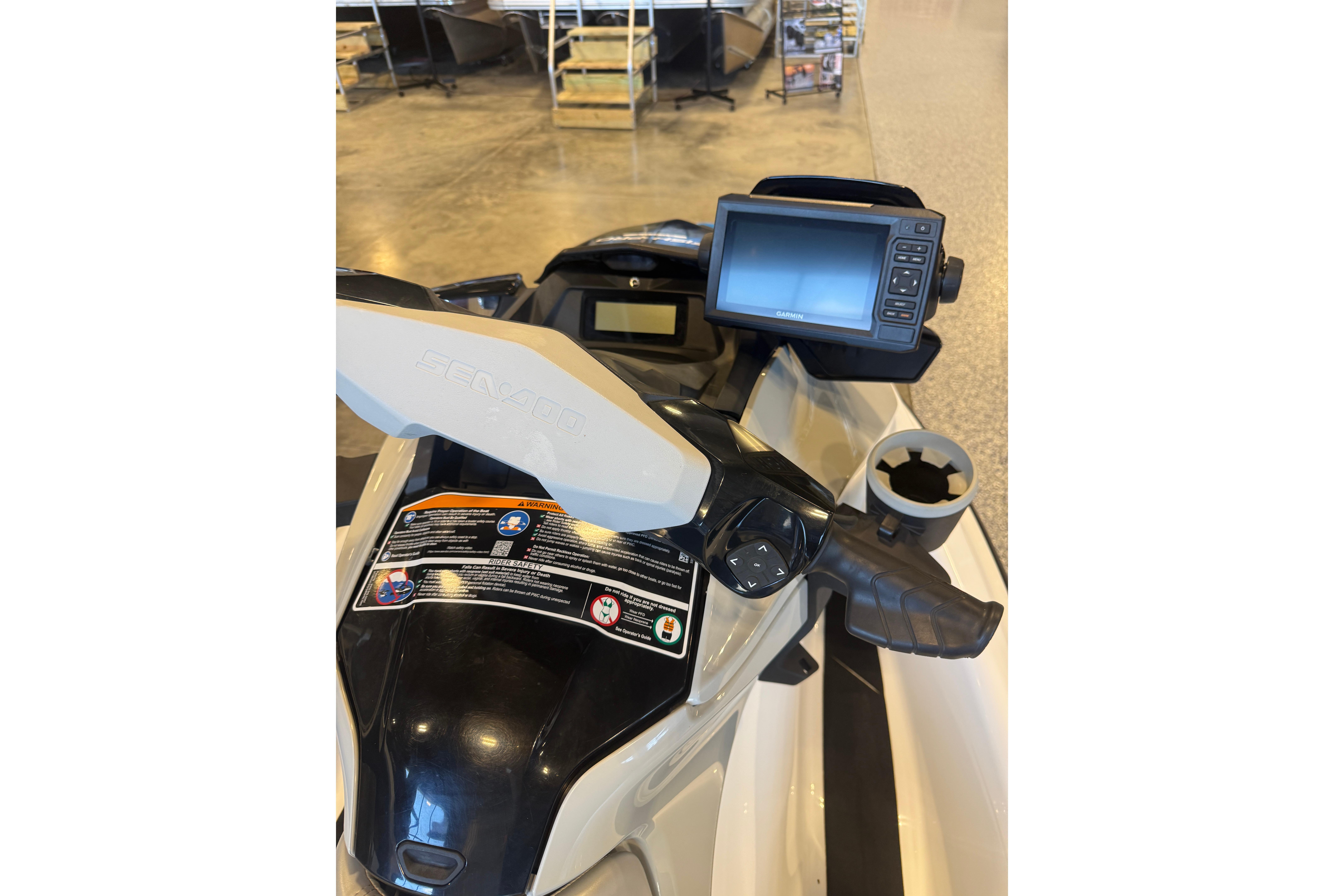 2022 Seadoo FishPro dashboard with navigation system and controls in showroom.