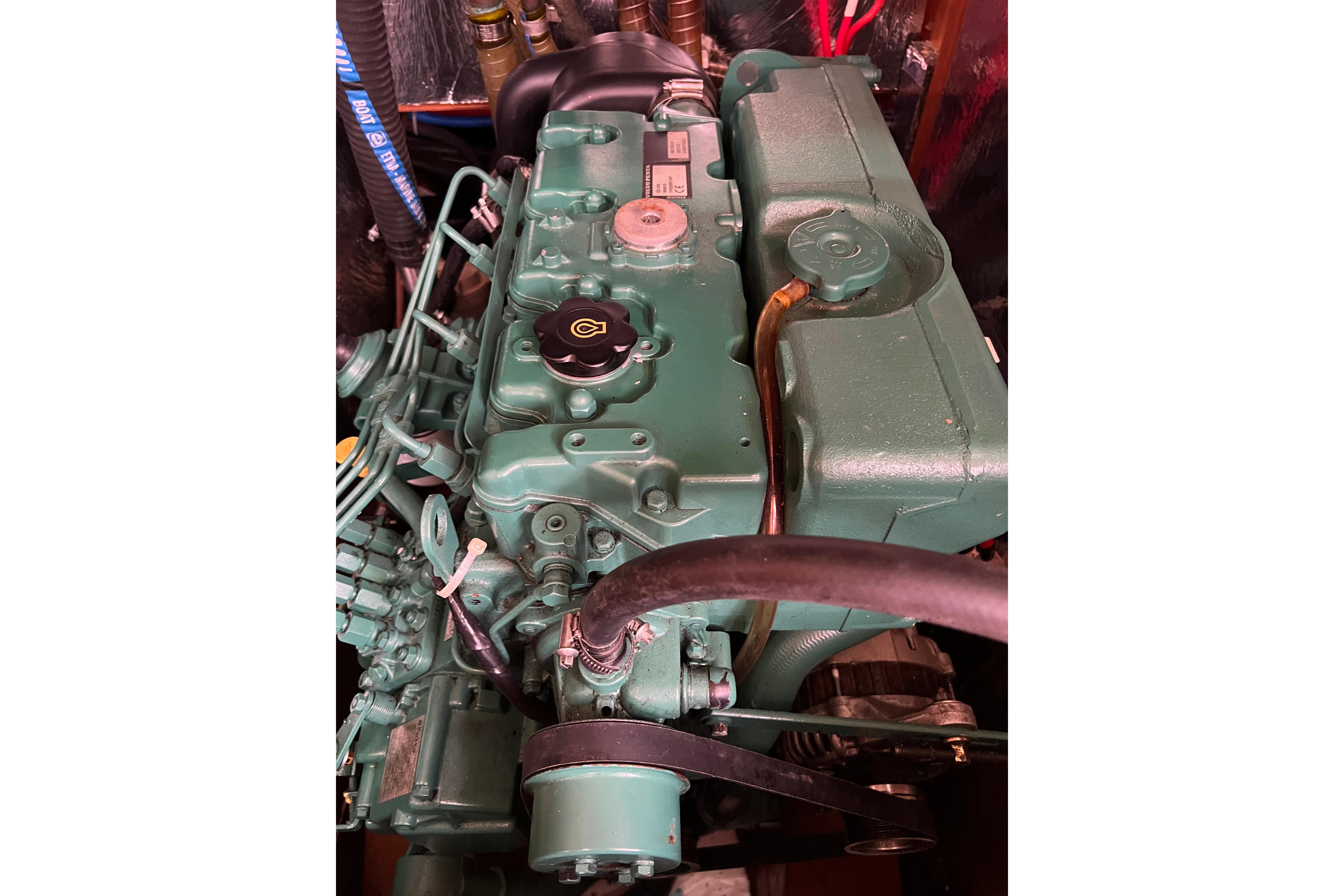 Engine of a 2008 Bavaria 40 Vision sailboat, showcasing intricate mechanical details.