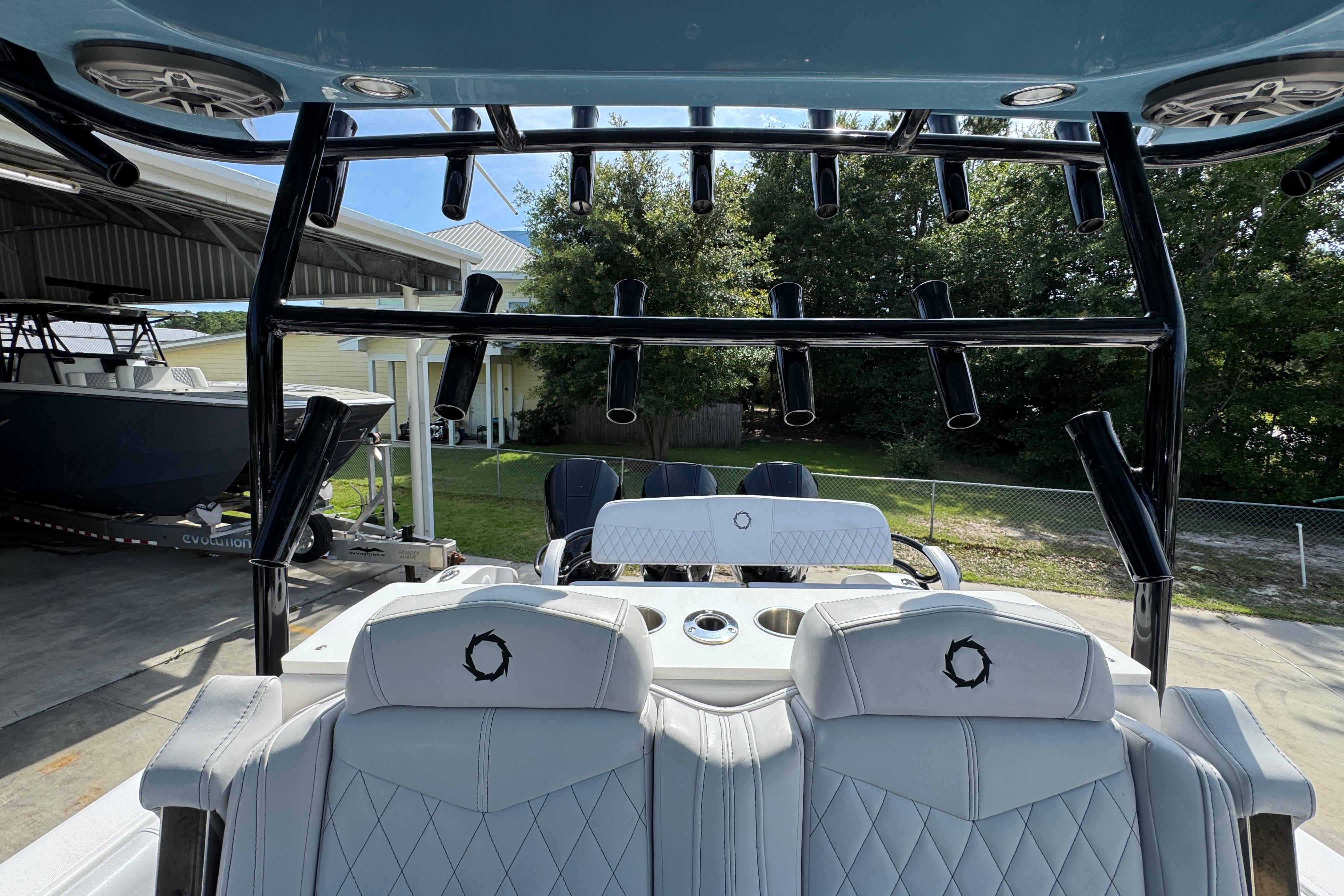 2023 Fountain 34 Tournament Edition boat interior with rod holders and seating.