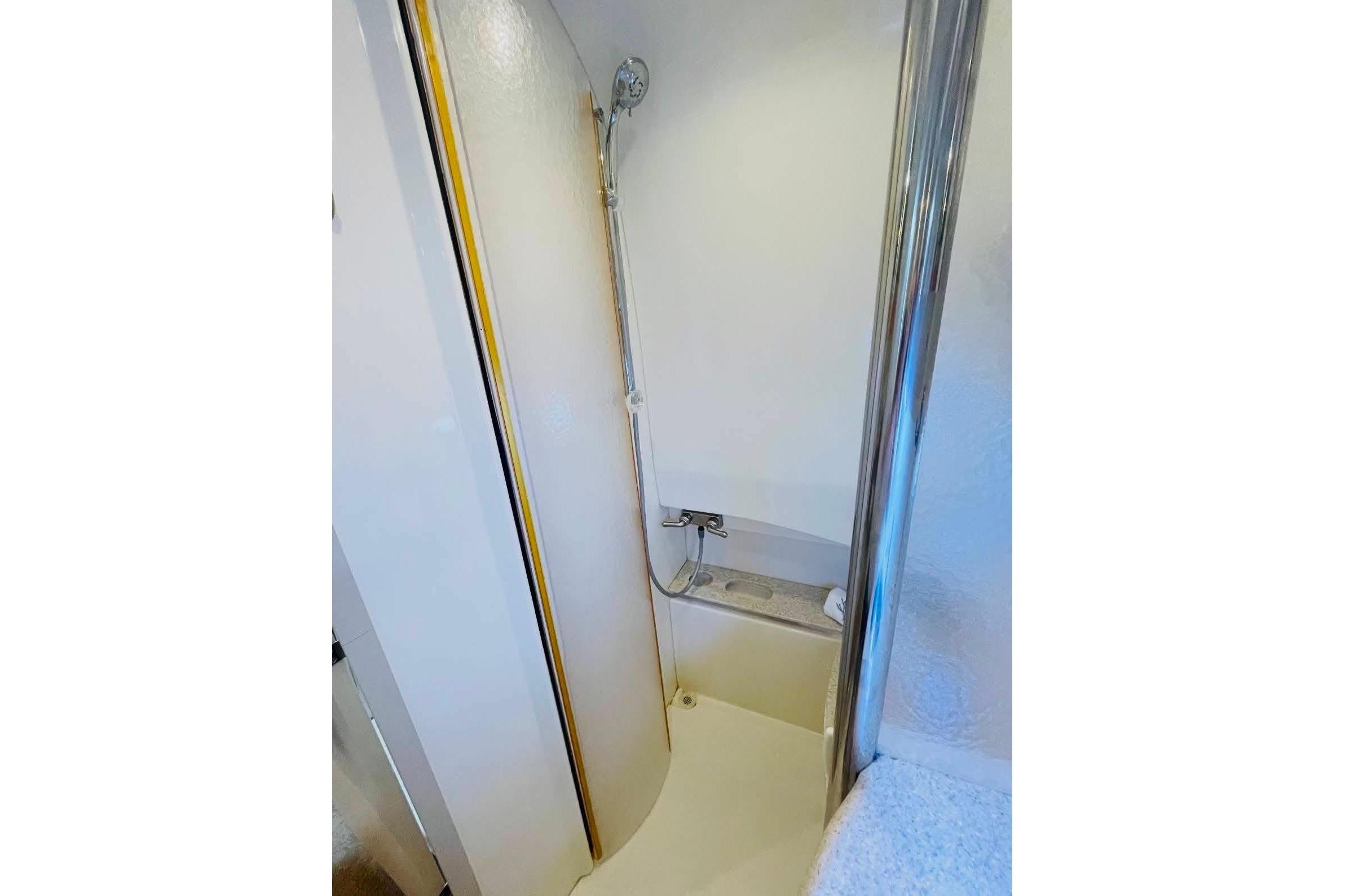 Shower area in 2003 Formula 40 Performance Cruiser yacht bathroom.