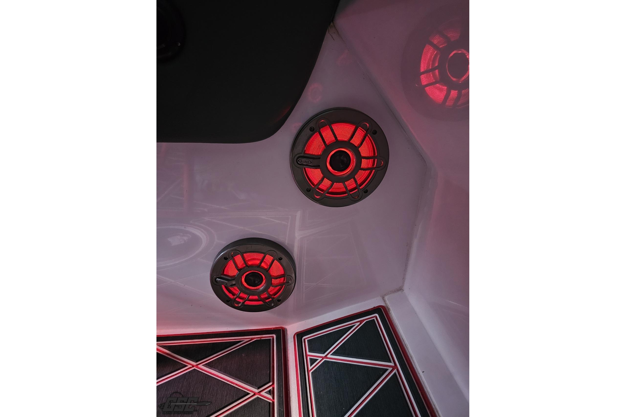 Red-lit speakers inside a 2008 Donzi 38 ZR boat cabin.