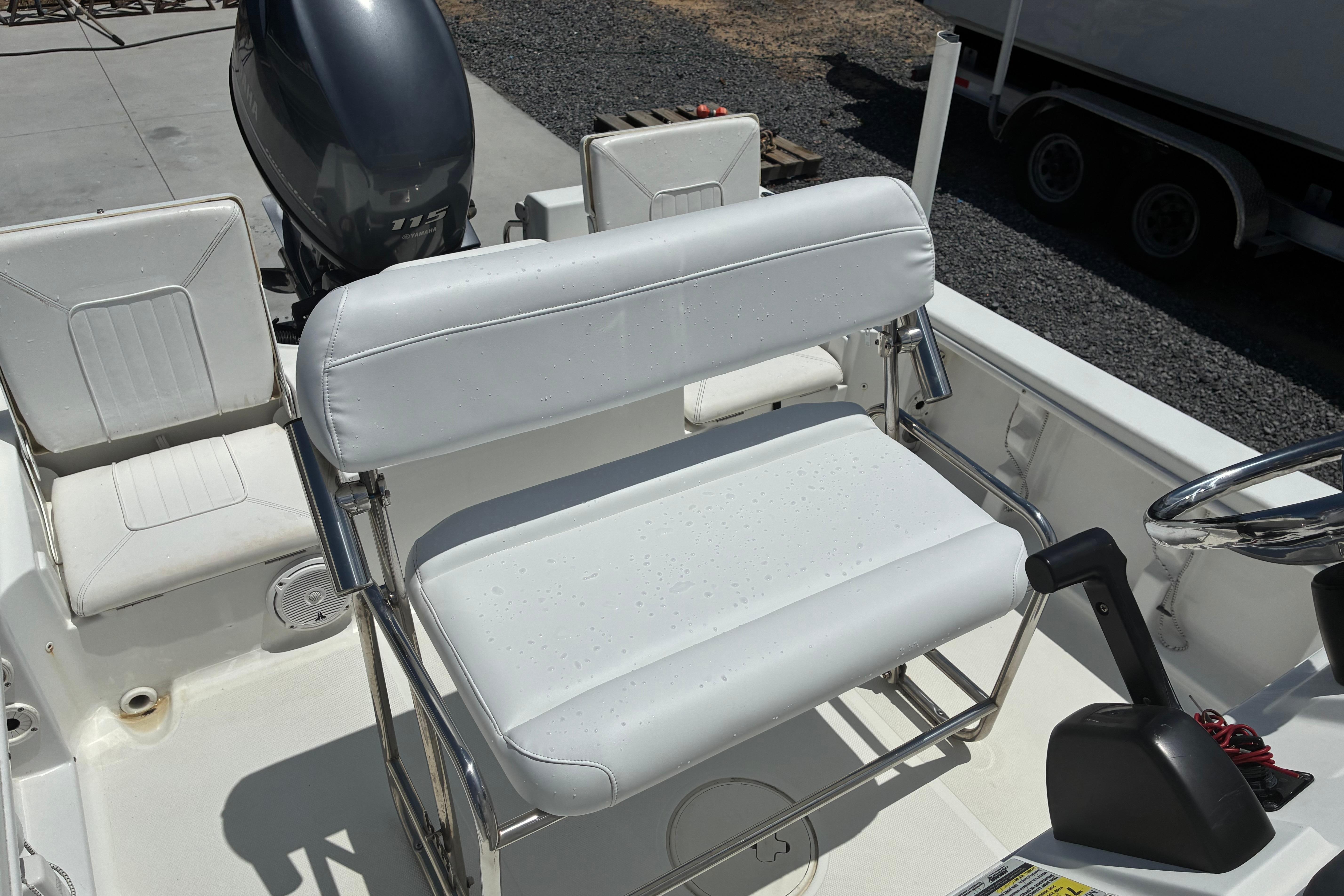 2014 Sea Hunt BX 20 BR boat interior with white seating and steering console.