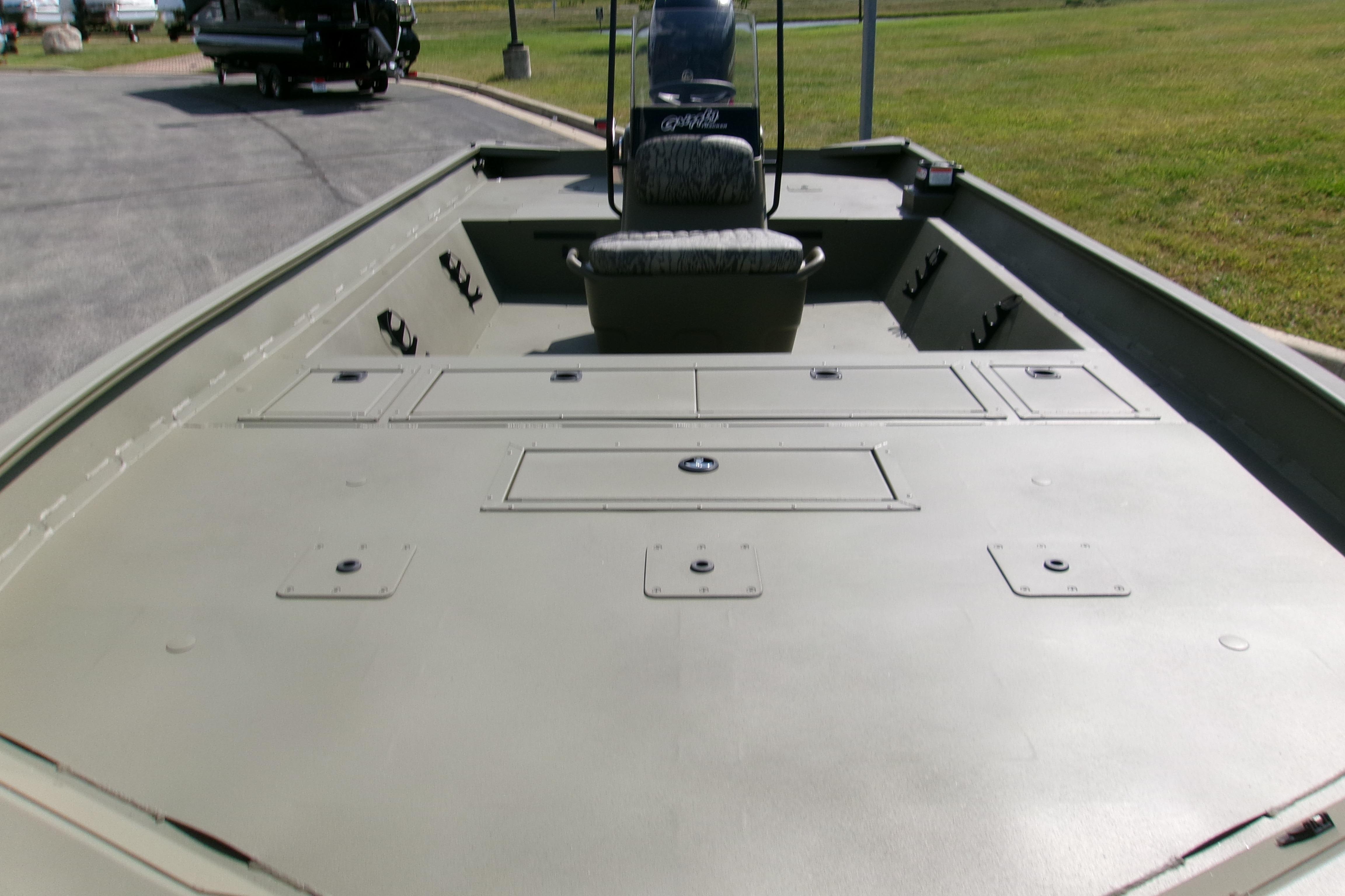 2026 Tracker Grizzly 2072 CC boat with spacious deck and central console.