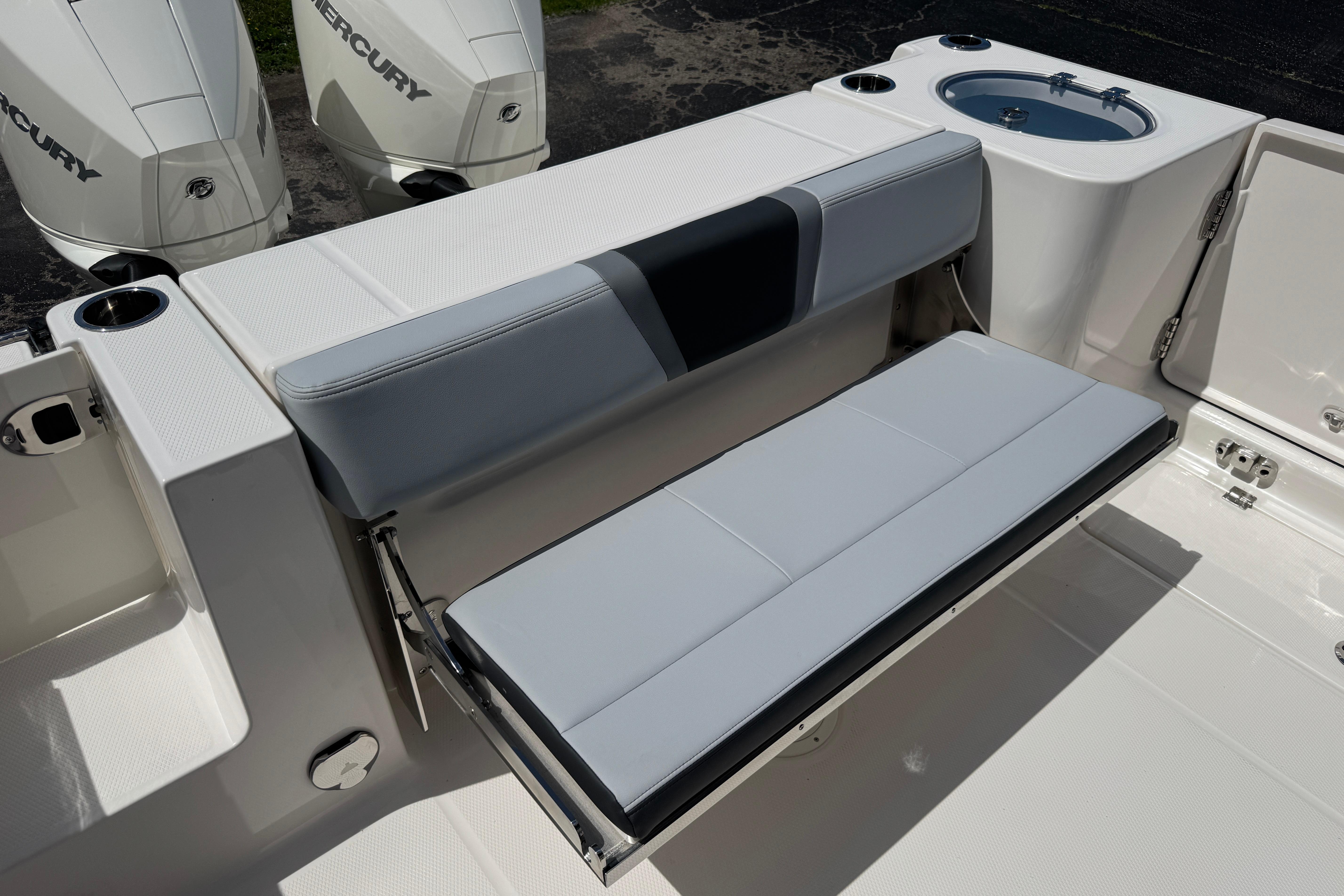 2026 Robalo R250 Center Console boat with foldable seating and dual Mercury engines.