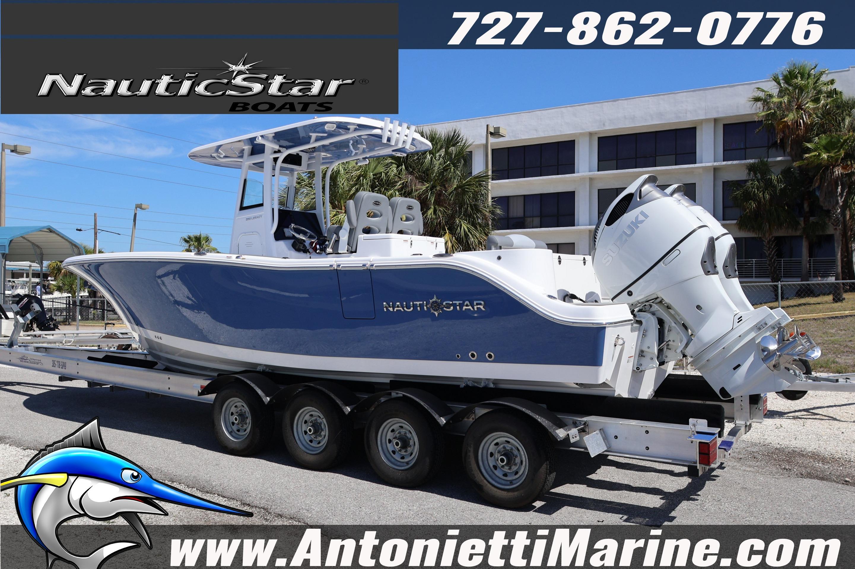 2026 NauticStar 292 Legacy boat on trailer, displayed at Antonietti Marine dealership.