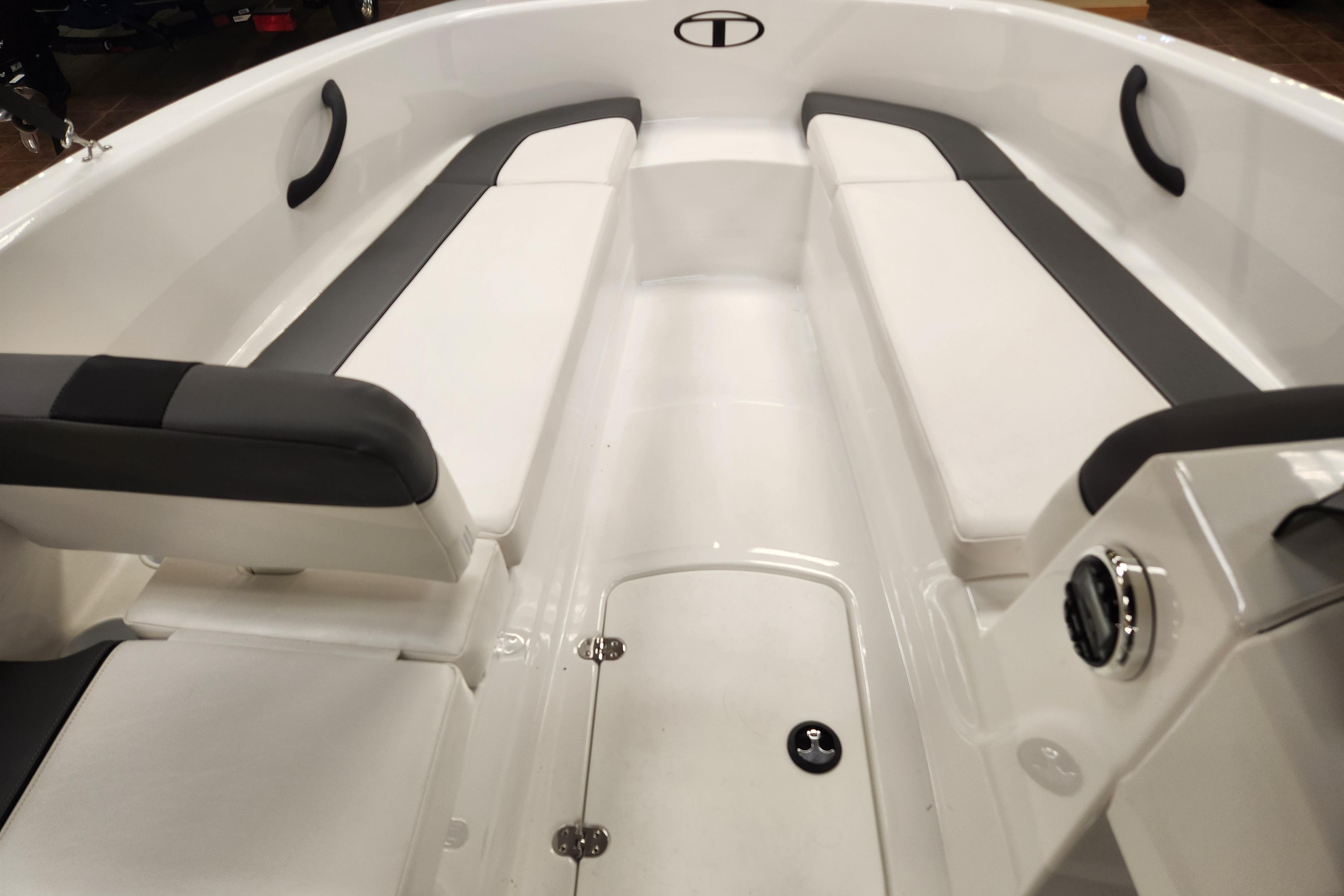Interior view of 2026 Tahoe T16 boat with white and gray seating.