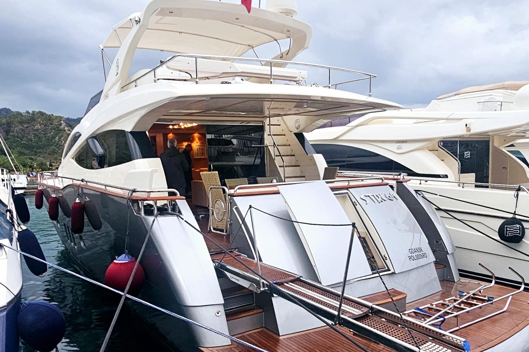 Luxury Evo Marine Deauville 76 yacht, 2008 model, docked at marina with elegant design.