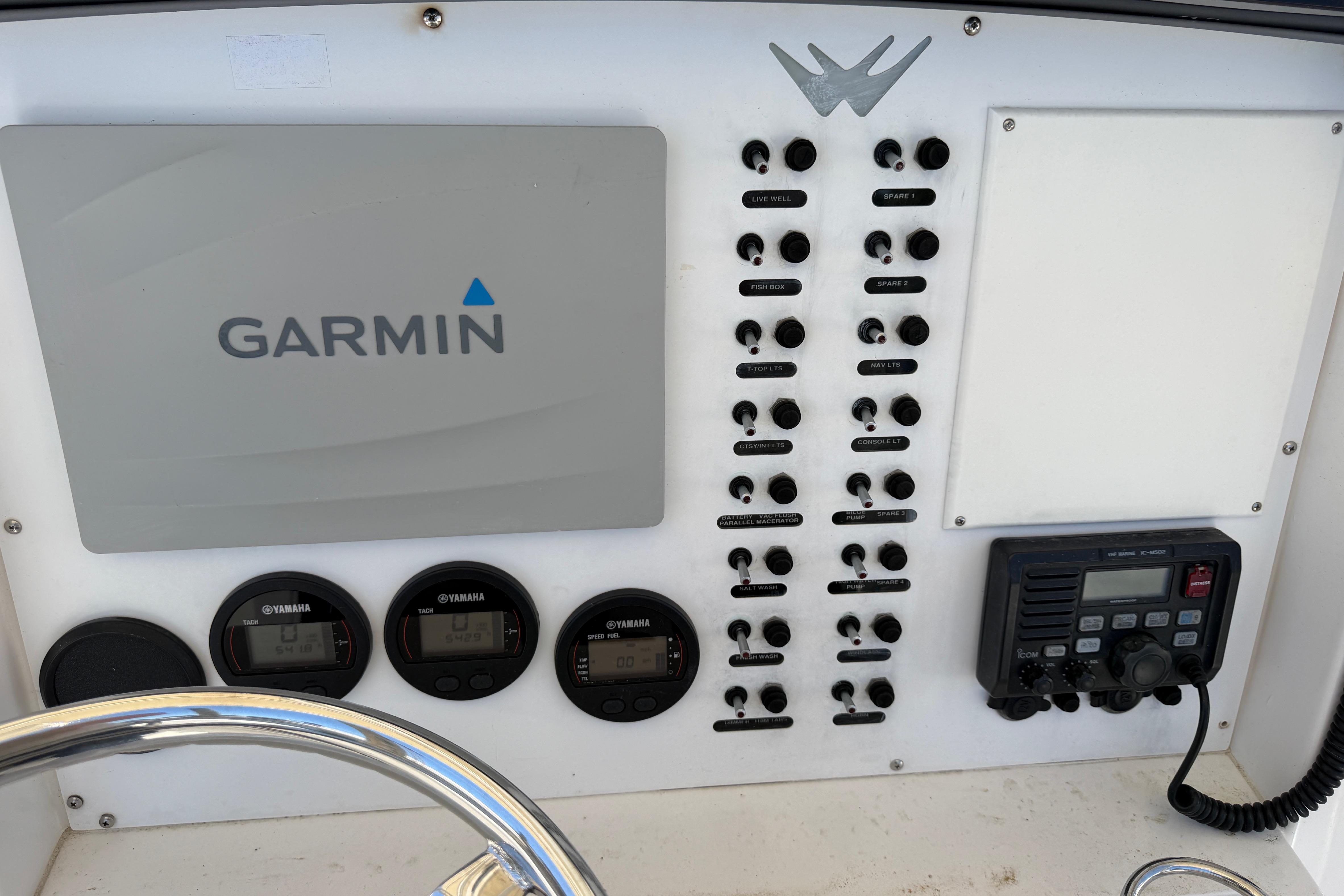 Control panel of a 2006 Southport 26 Center Console boat with Garmin electronics.