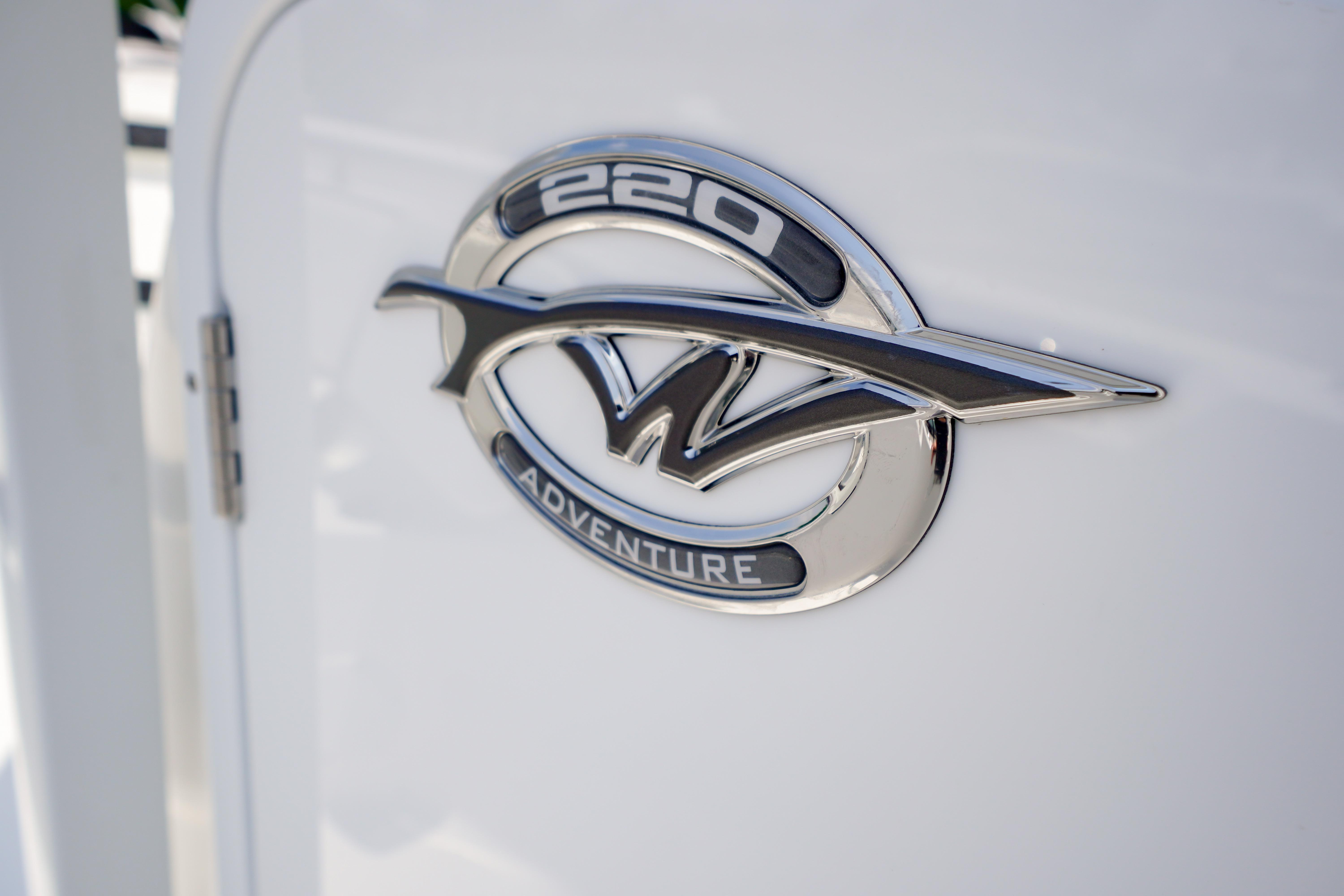 2027 Tidewater 220 CC Adventure emblem on a white surface.