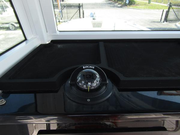 2024 Wellcraft 263 Fisherman boat compass and dashboard.