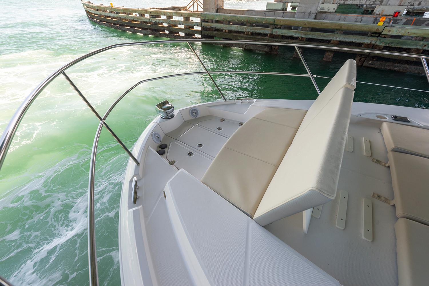 Manufacturer Provided Image: 2022 Regal 38 Grande Coupe bow seating area with water view.